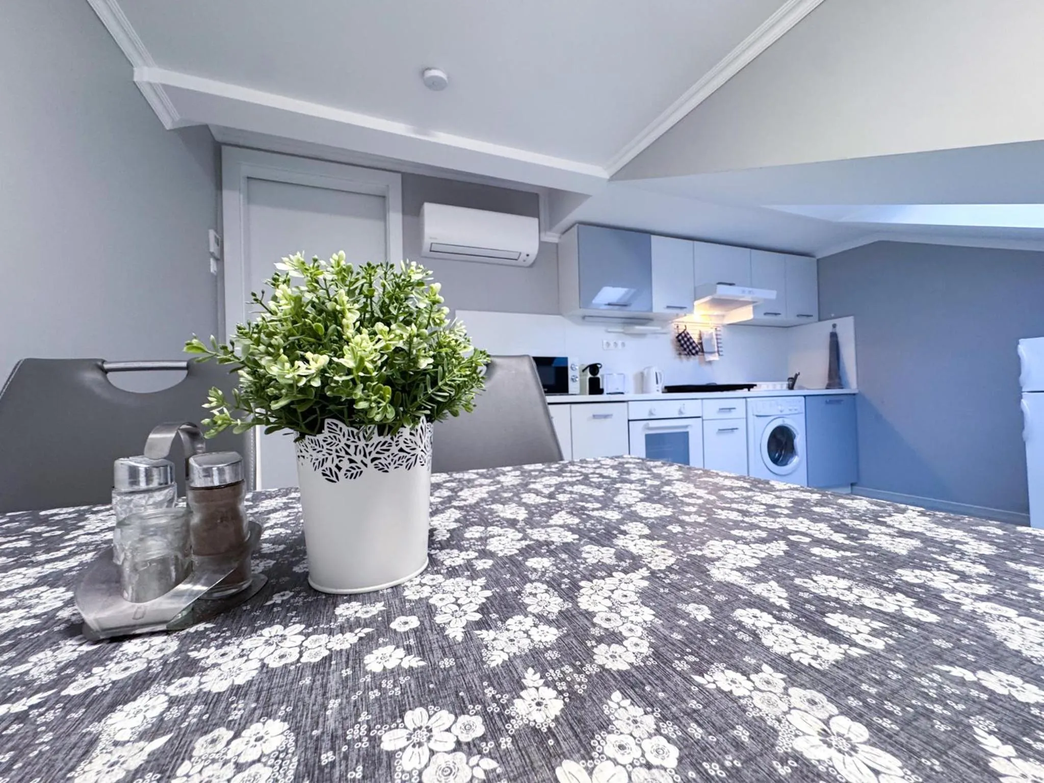 Kitchen or kitchenette in Camille Apartmanhouse