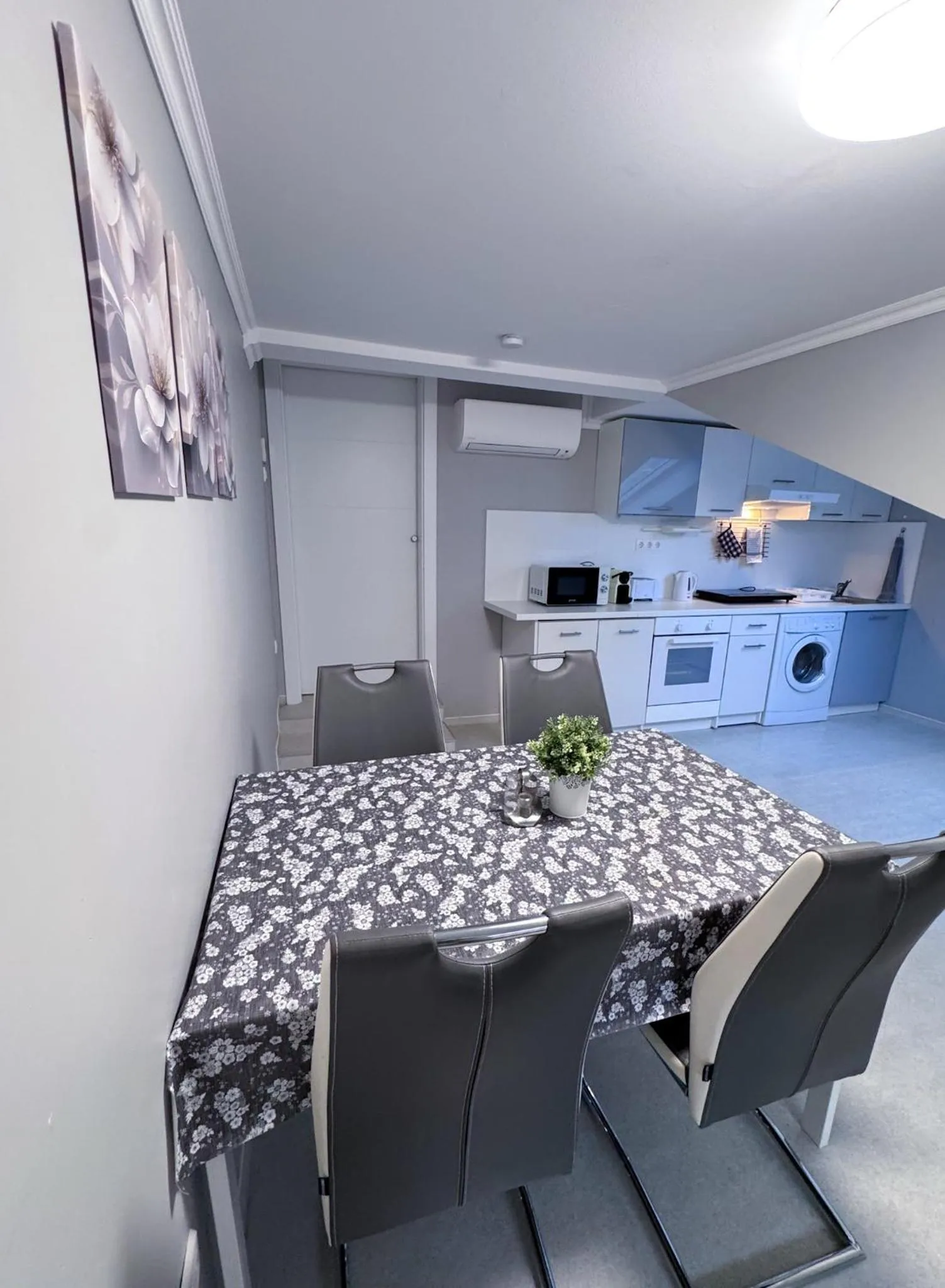 Kitchen or kitchenette in Camille Apartmanhouse