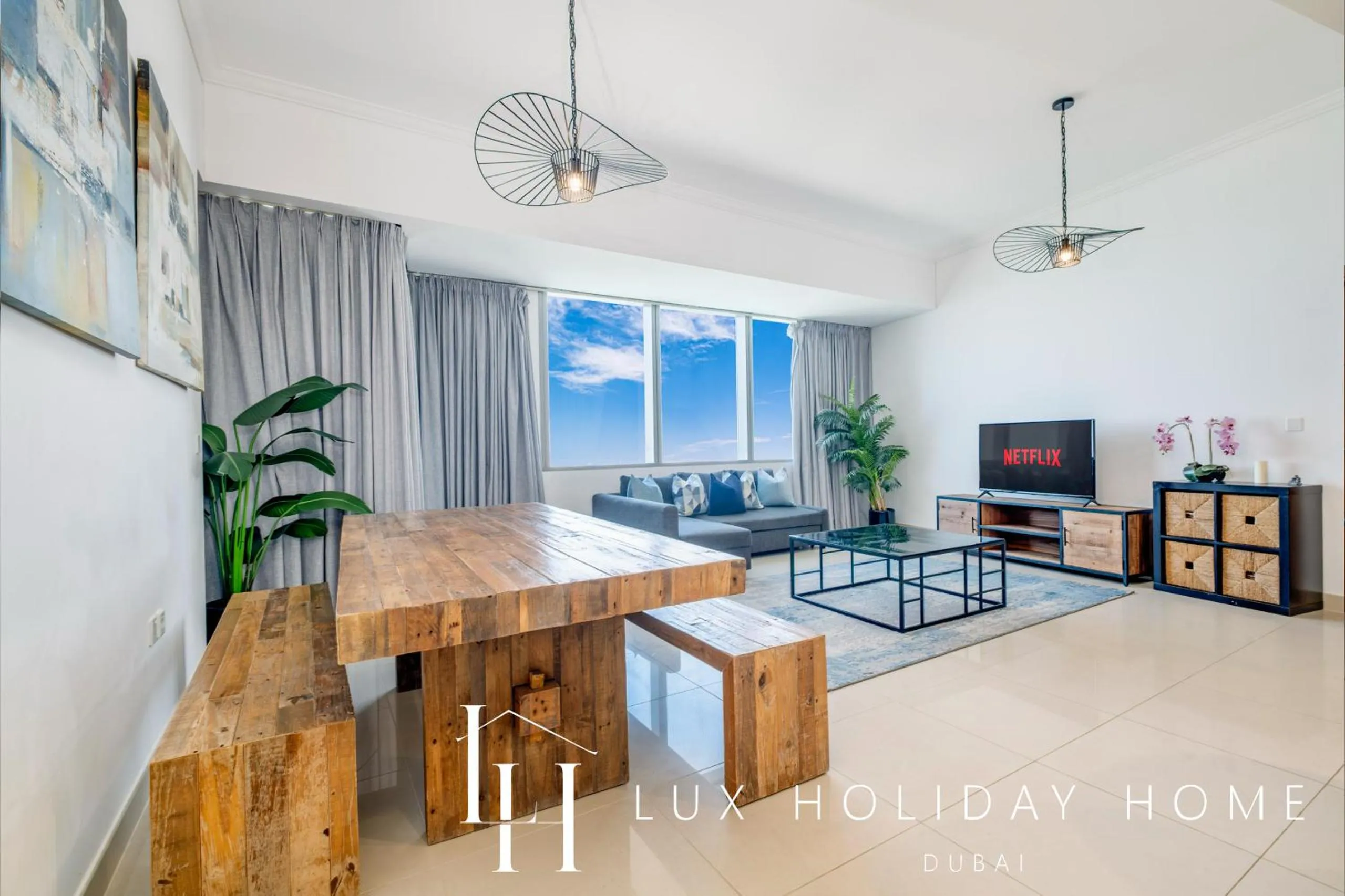 Living room in LUX The Sky View Suite Dubai Marina