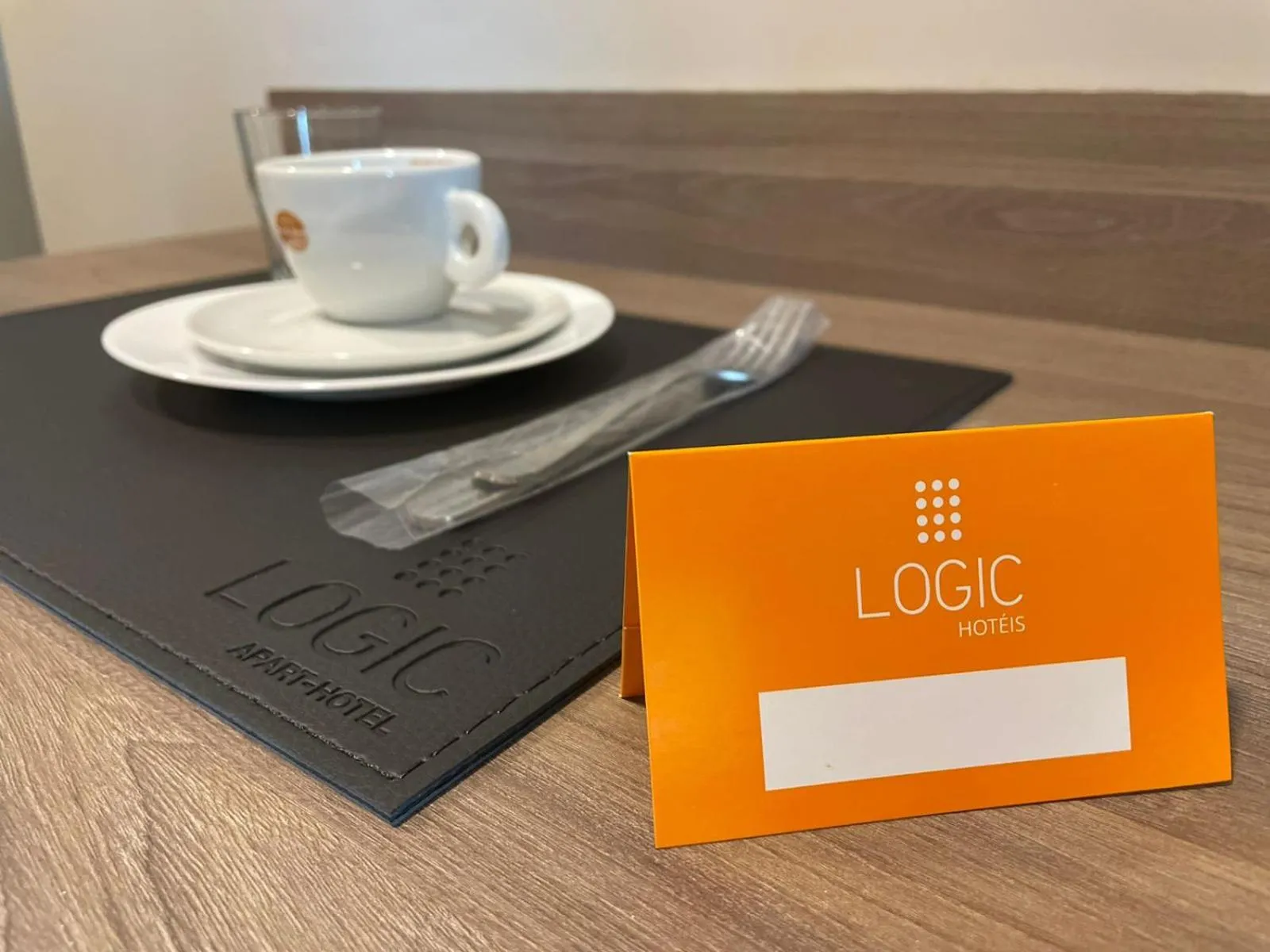 Logo/Certificate/Sign in Logic Hotel Volta Redonda