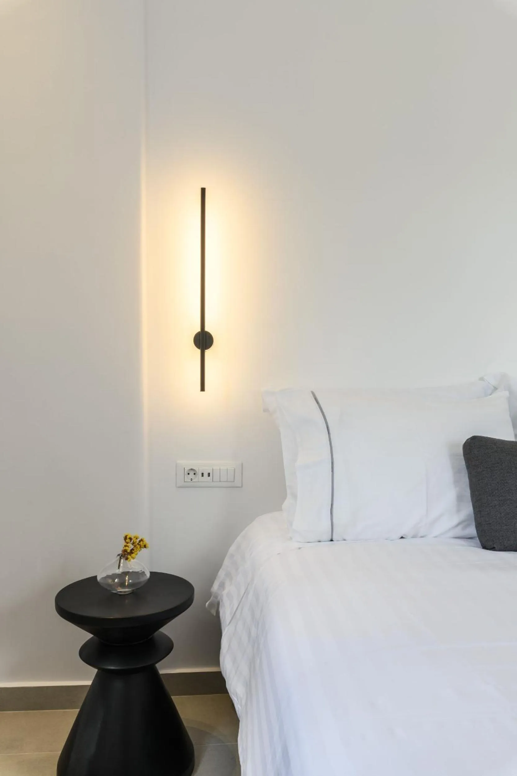 Bed in Sunset Windmills Suites