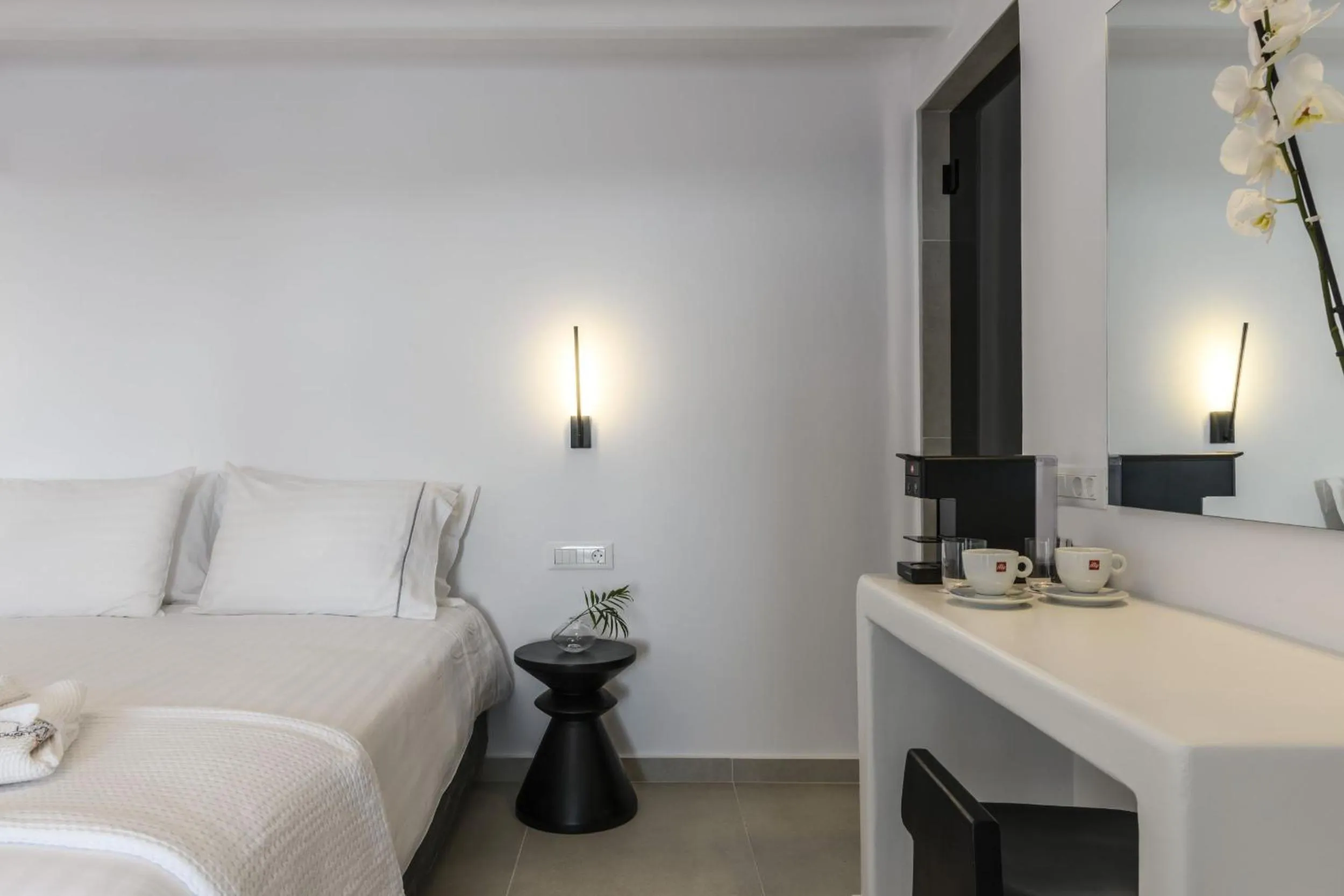 Bed in Sunset Windmills Suites