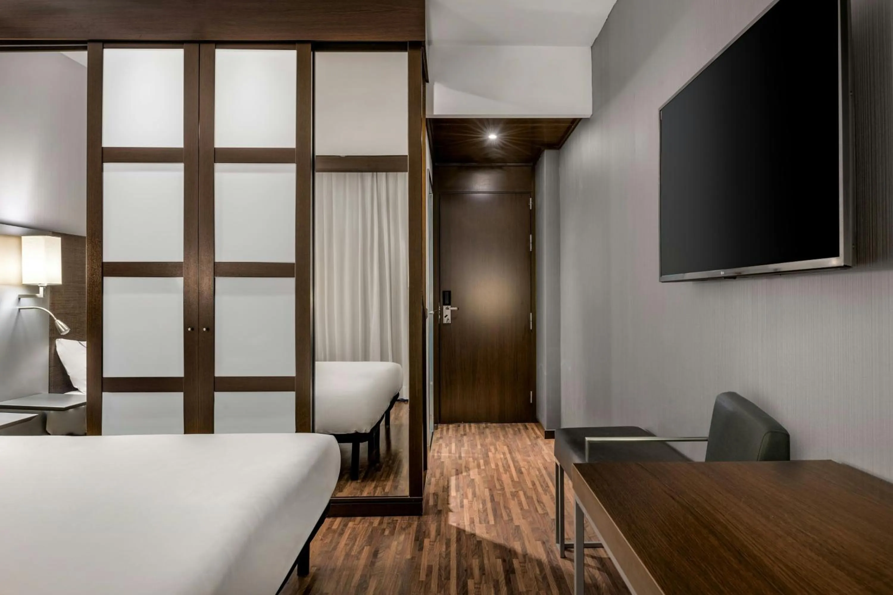 Photo of the whole room, Bed in AC Hotel by Marriott Pisa