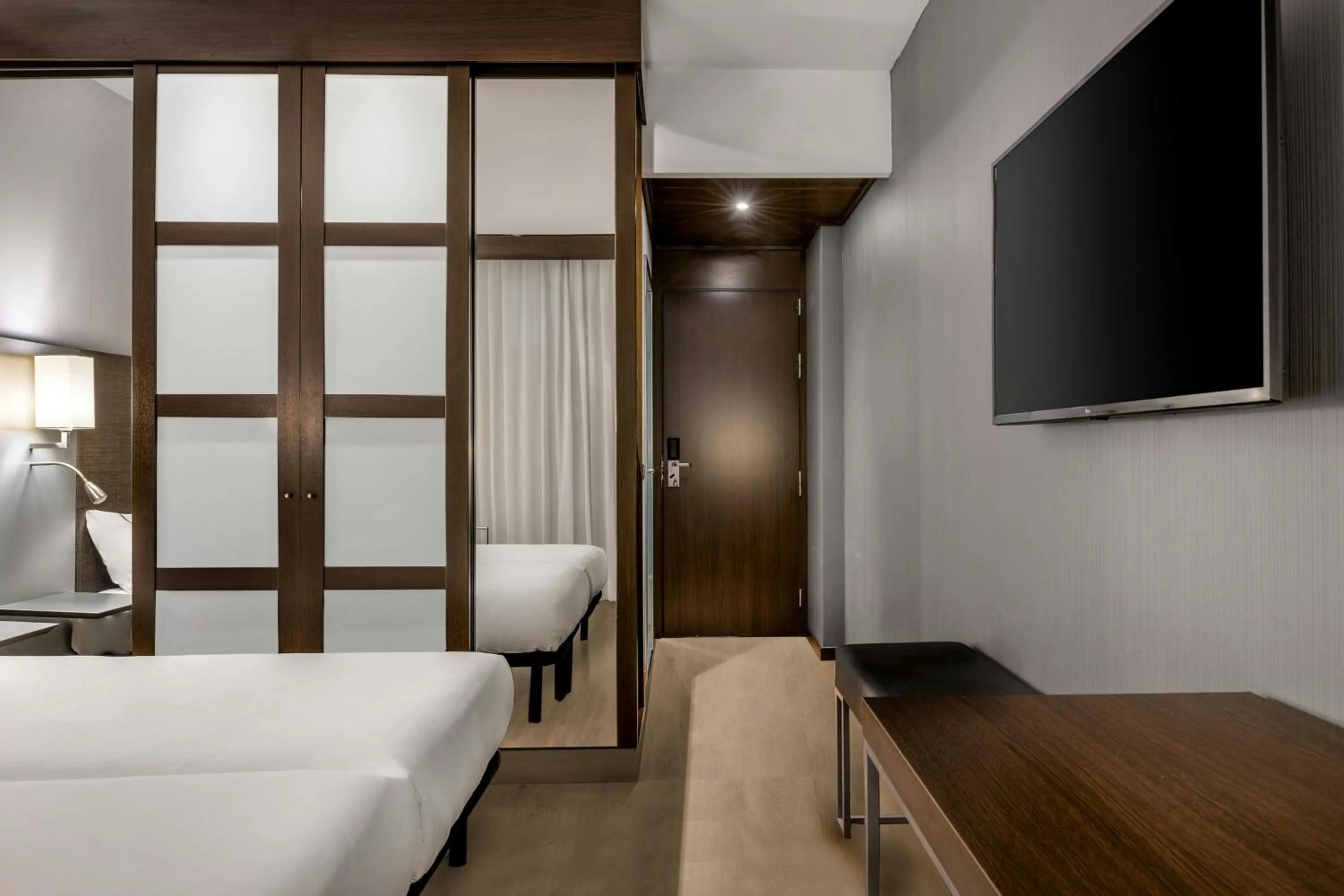 Photo of the whole room, Bed in AC Hotel by Marriott Pisa