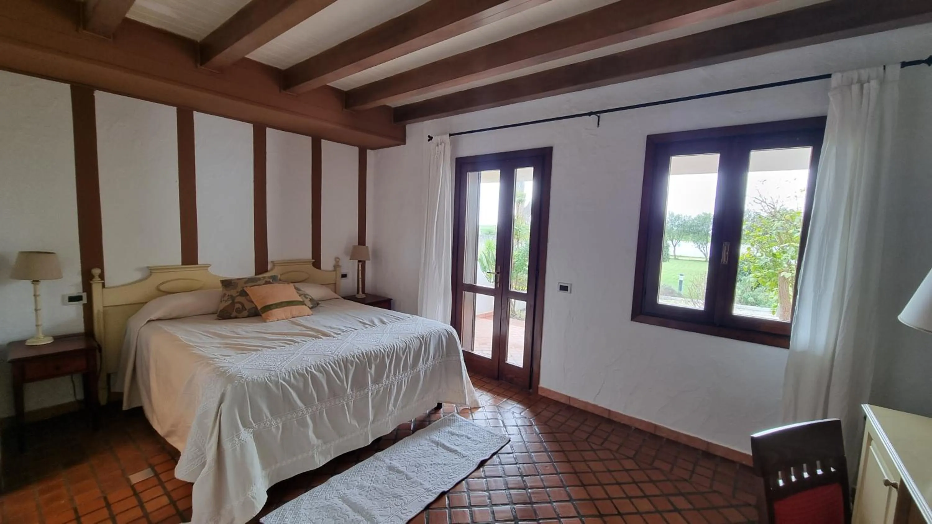 Patio, Bed in Is Benas Country Lodge