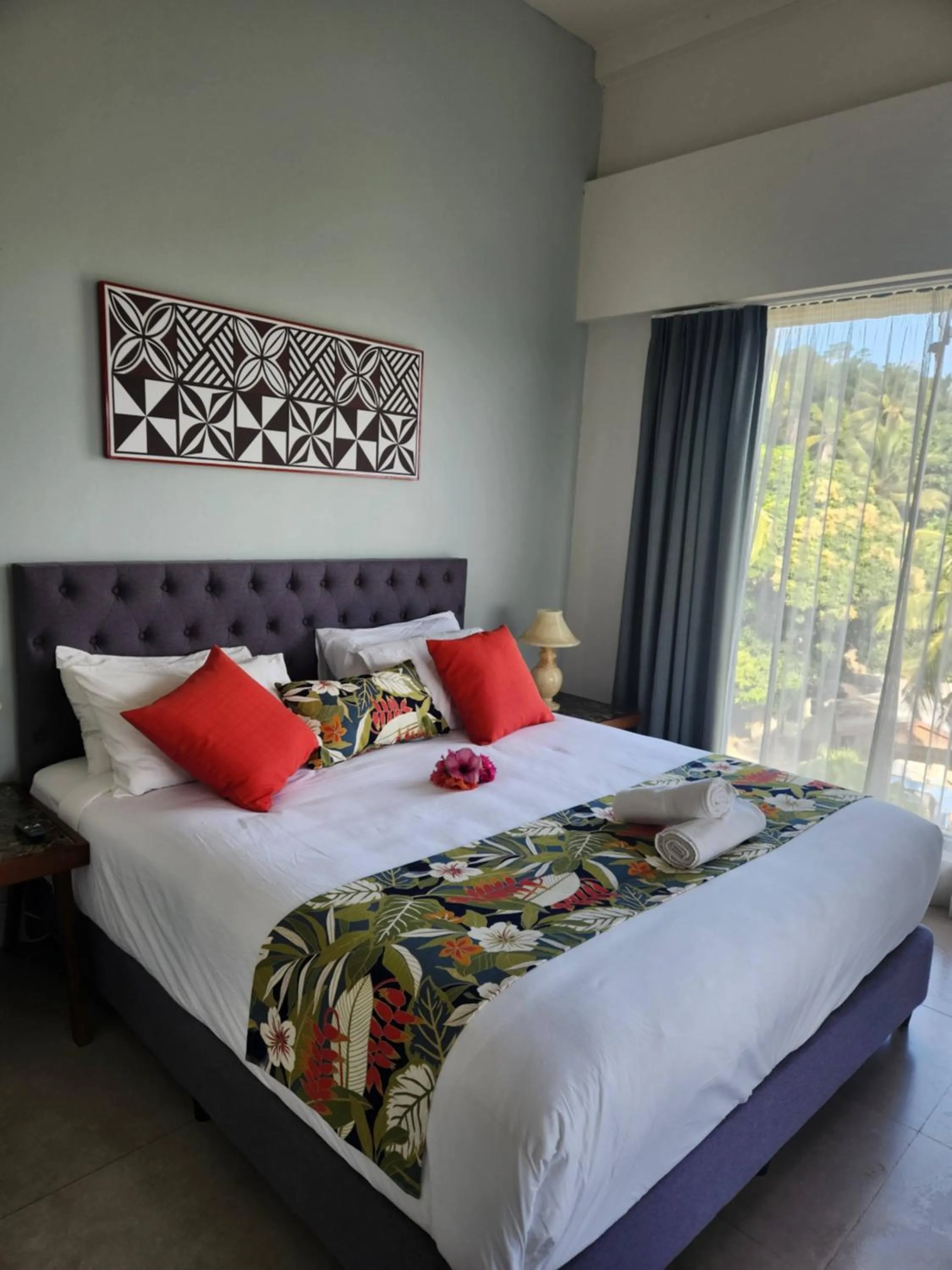 Bed in Ramada Suites By Wyndham Seafront Coral Coast
