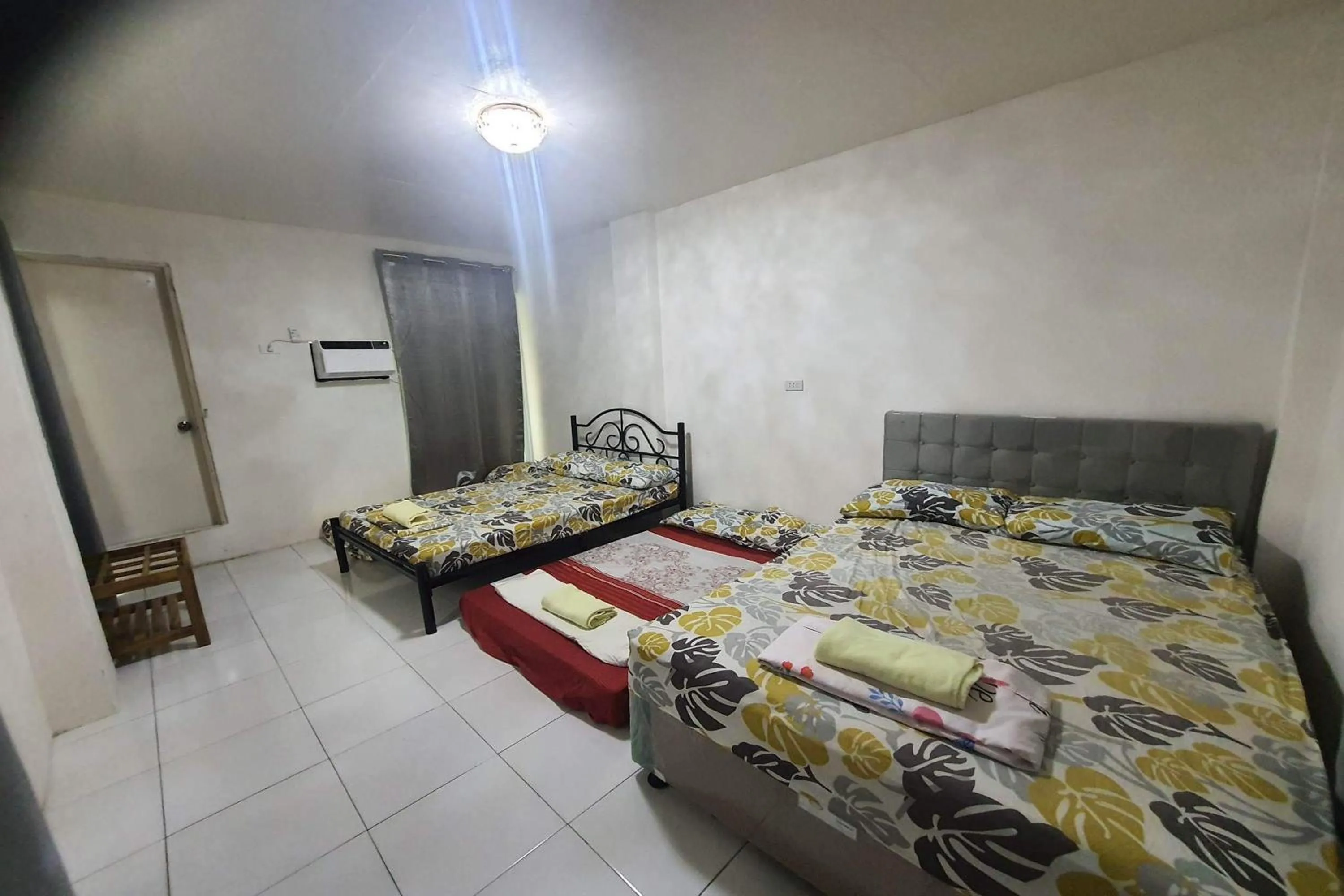 Bed in Bohol Transient Lruy near Panglao Beach