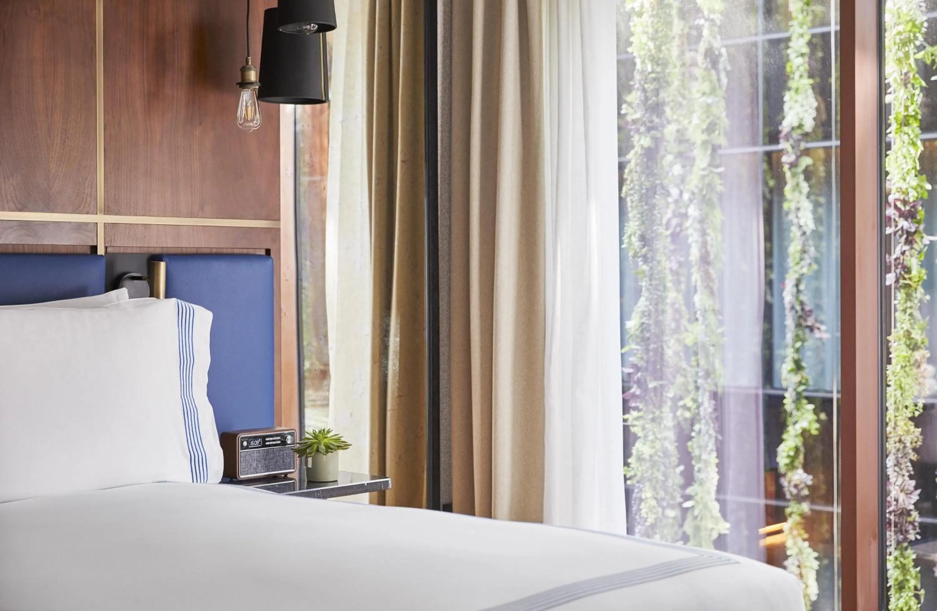 Bed in Thompson Madrid, by Hyatt