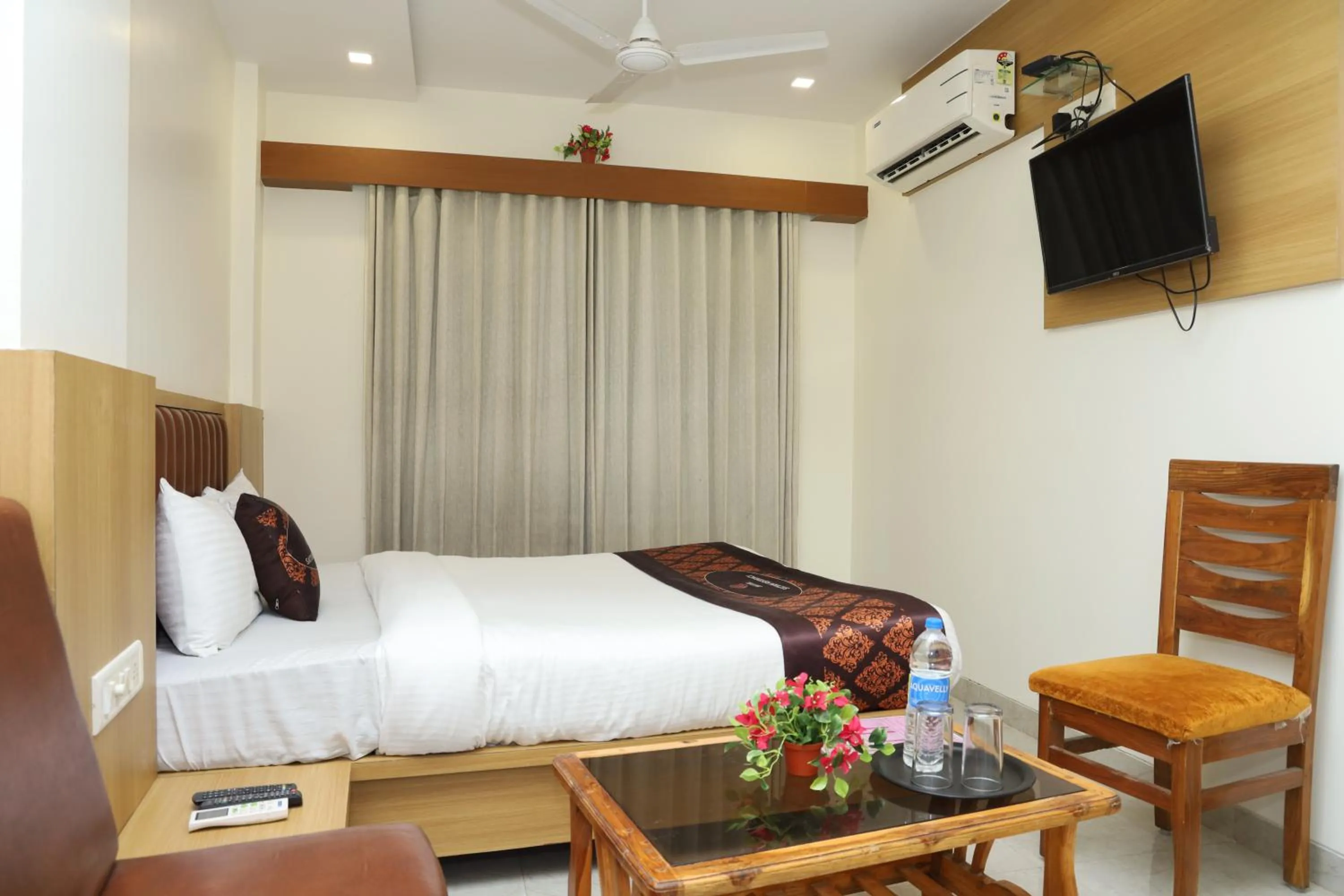 Bed in Hotel Satyam Residency