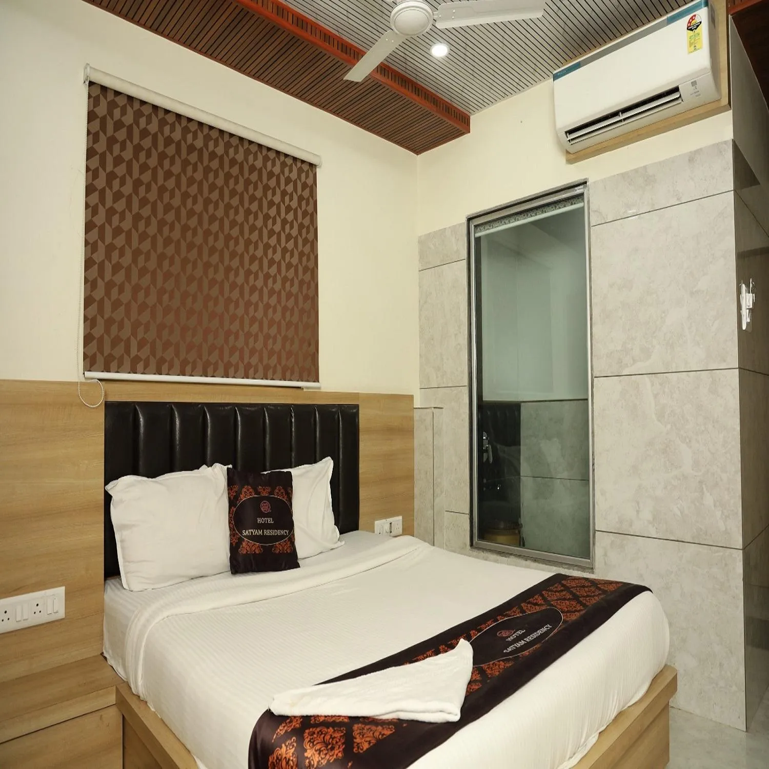 Photo of the whole room, Bed in Hotel Satyam Residency