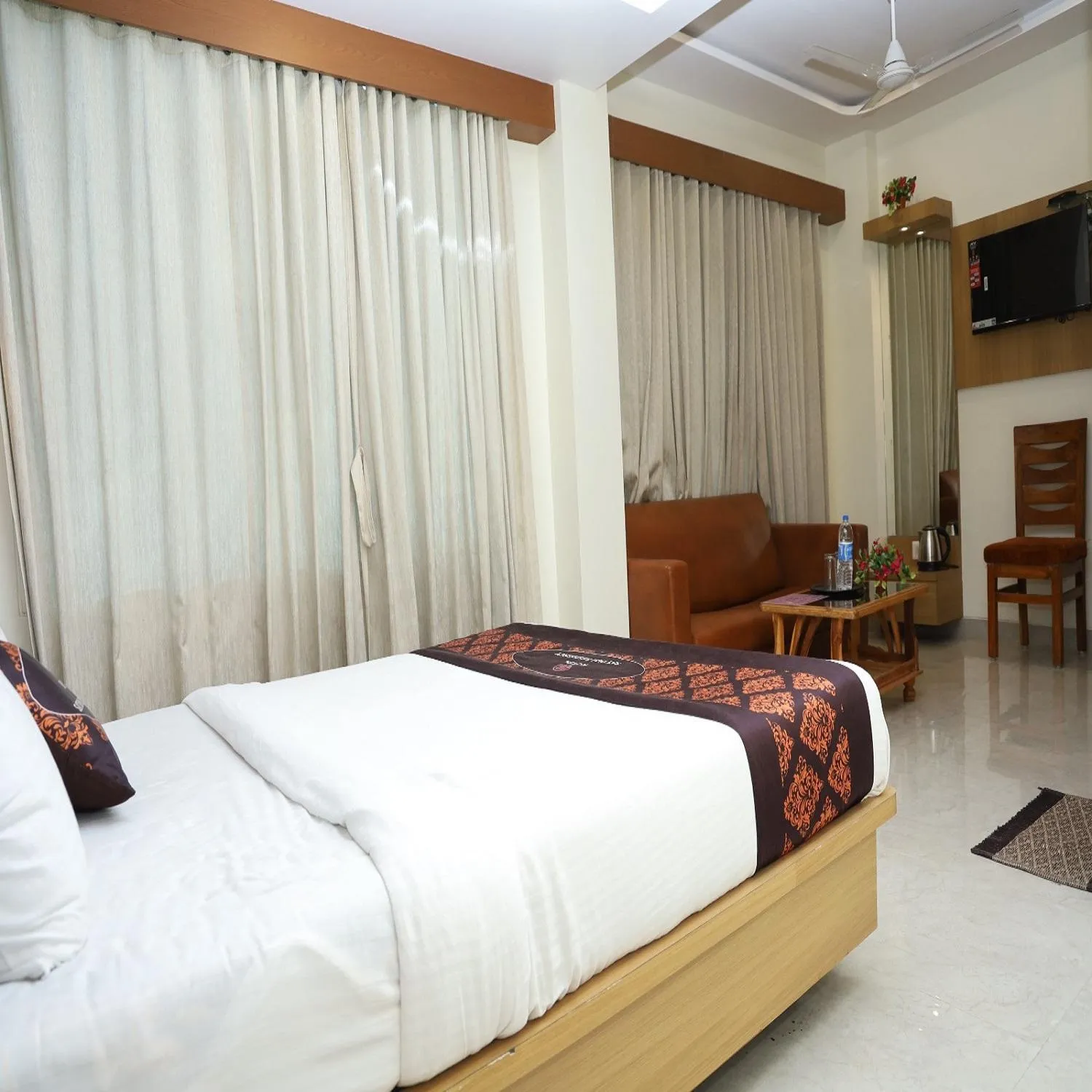 Bed in Hotel Satyam Residency
