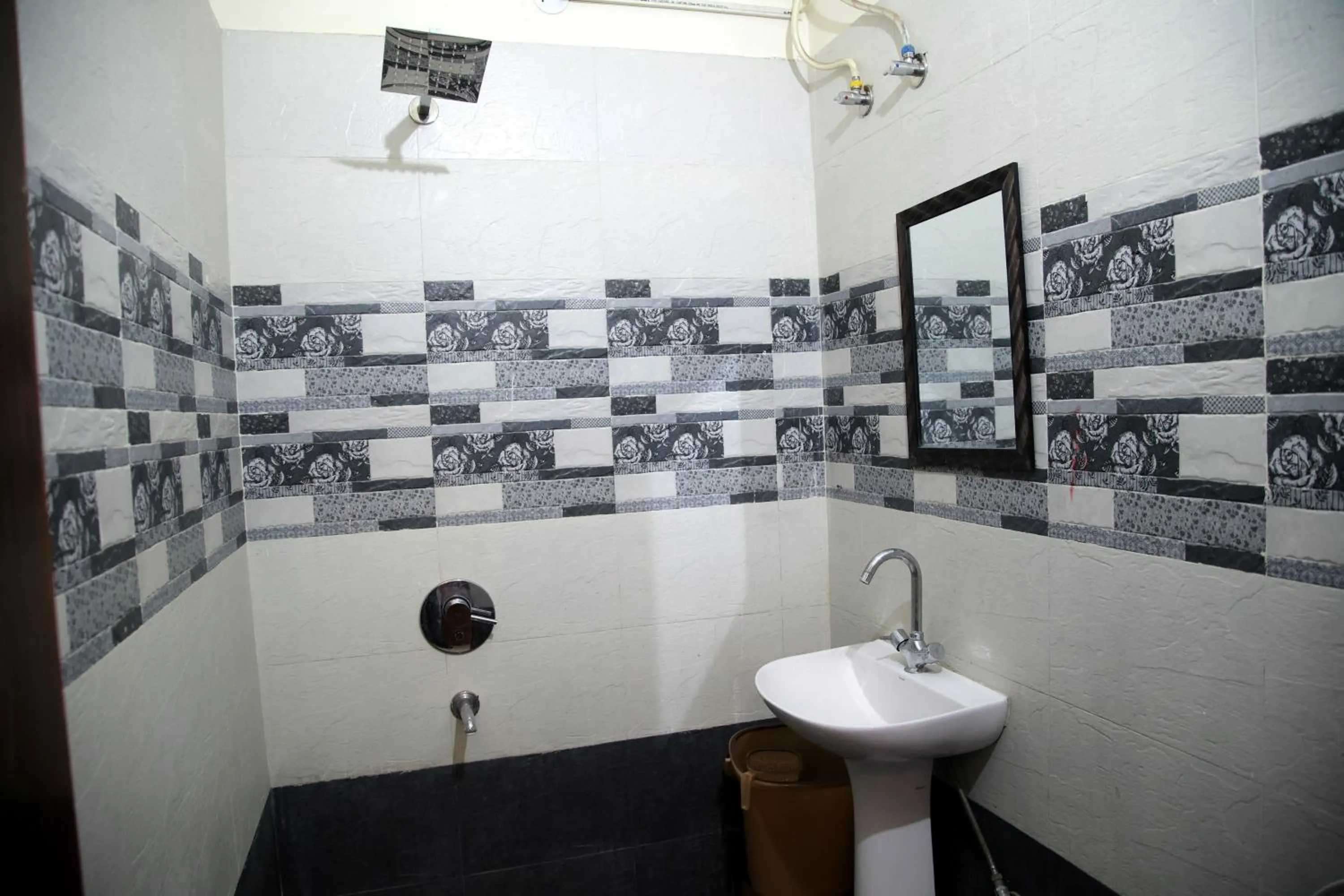 Bathroom in Hotel O Galaxy Stays