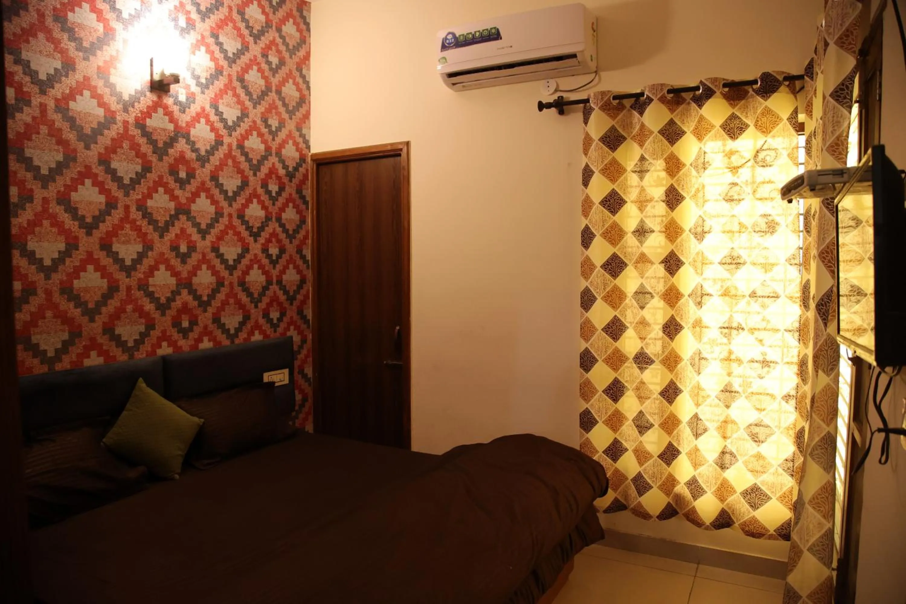 Bedroom in Hotel O Galaxy Stays