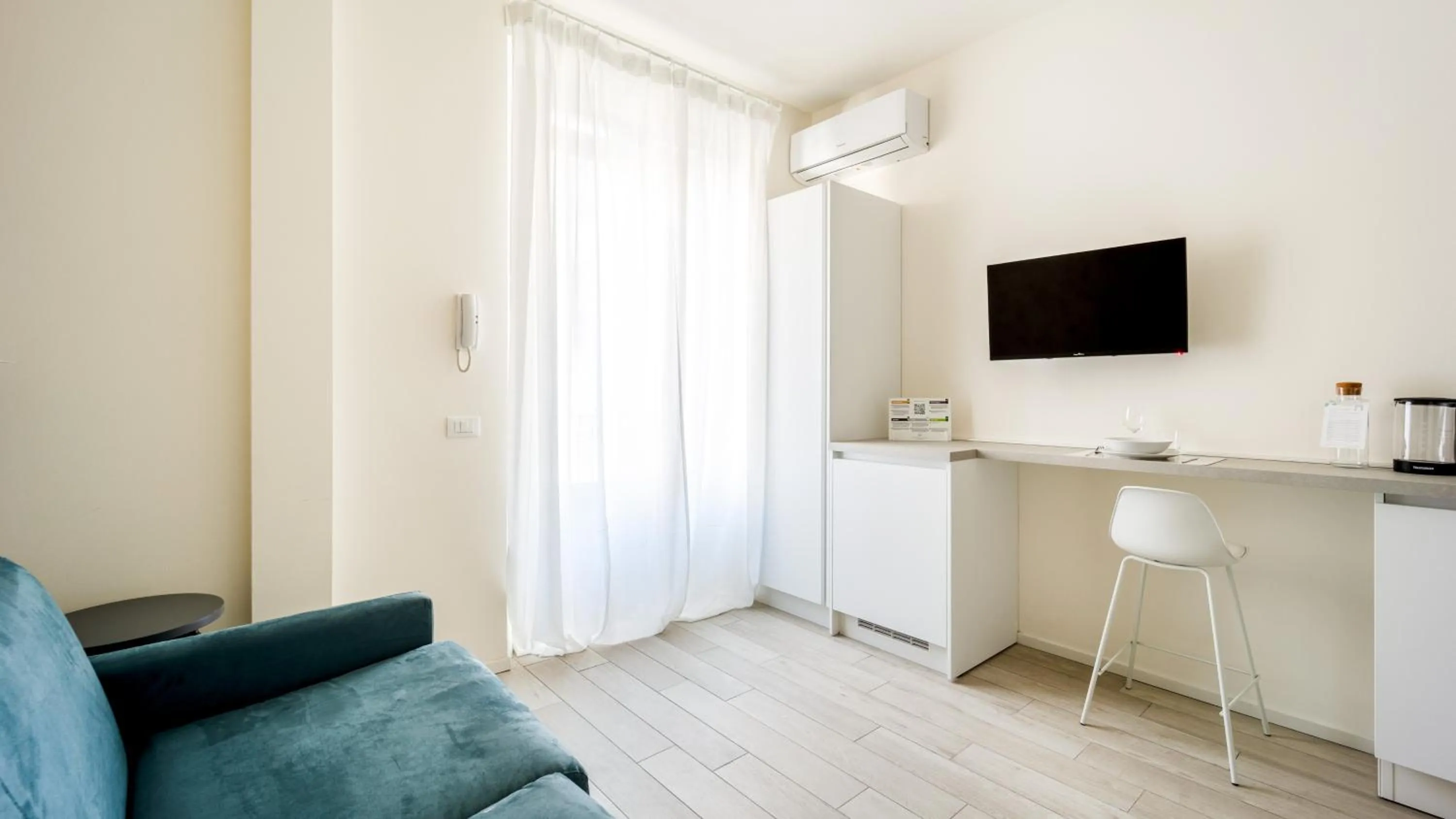 Seating area in Italianway - The B Village Business