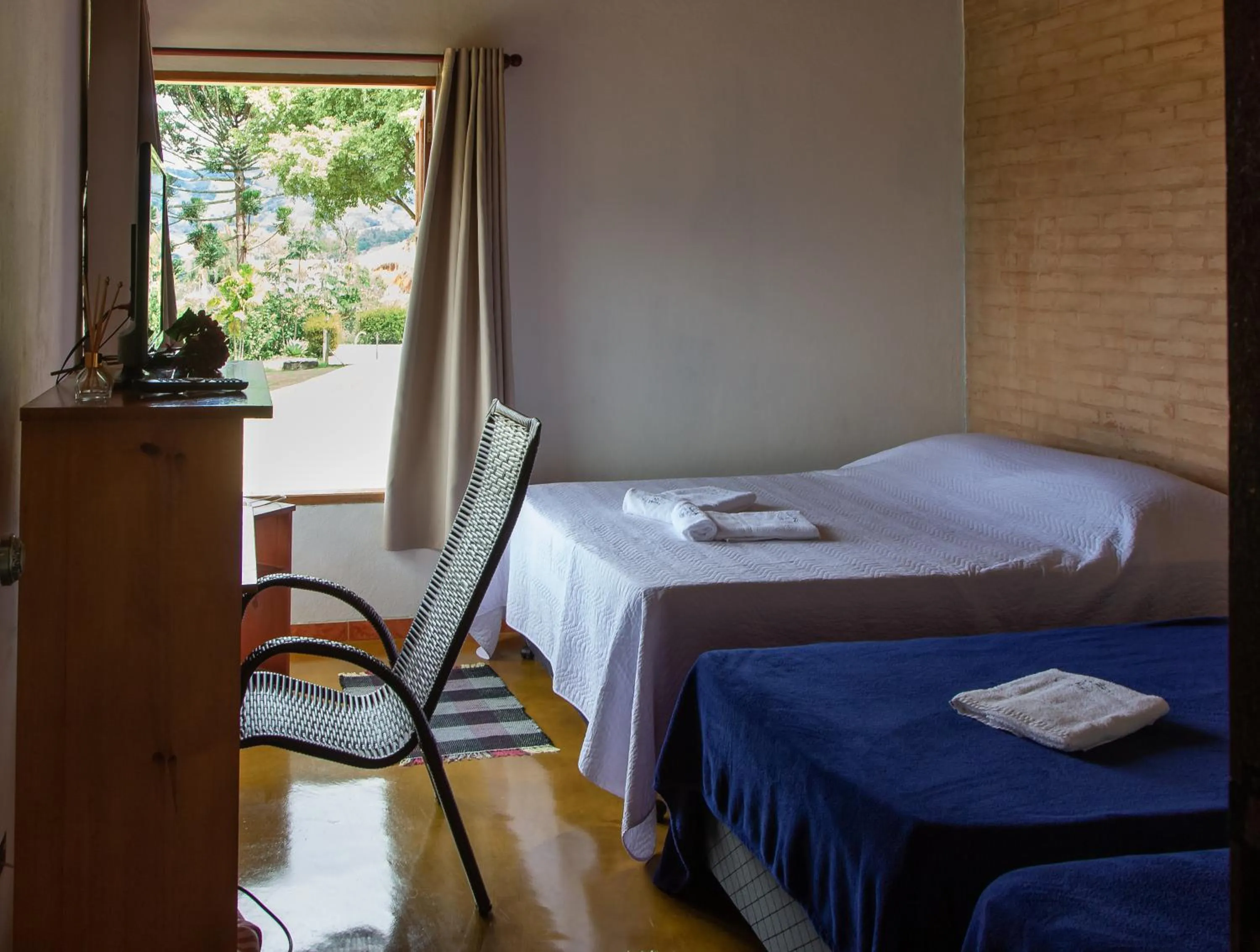 Bed in Pousada Vitória