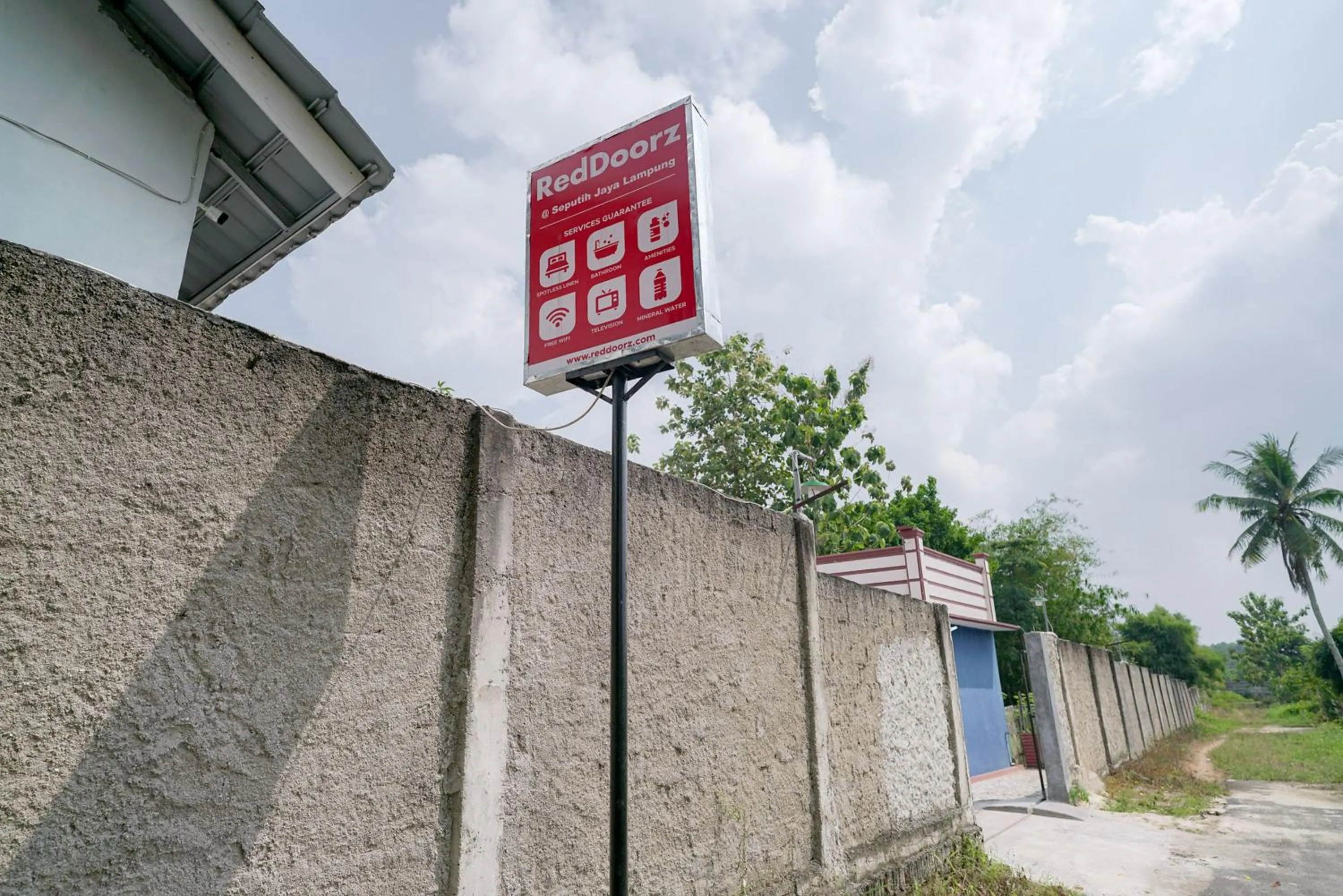 Property logo or sign in RedDoorz @ Seputih Jaya Lampung
