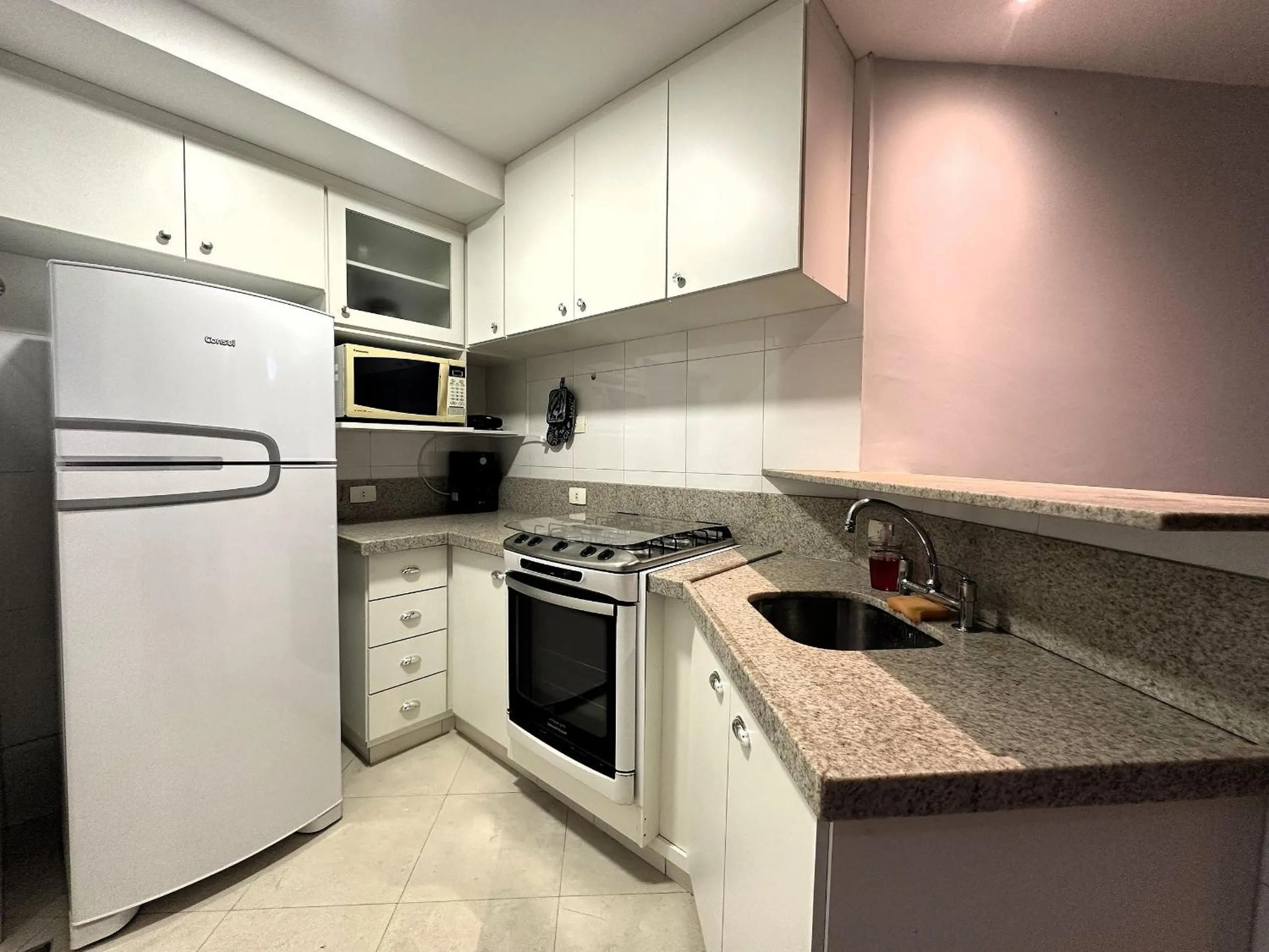 Kitchen or kitchenette in Rental Home Barra Palace Vista para o mar