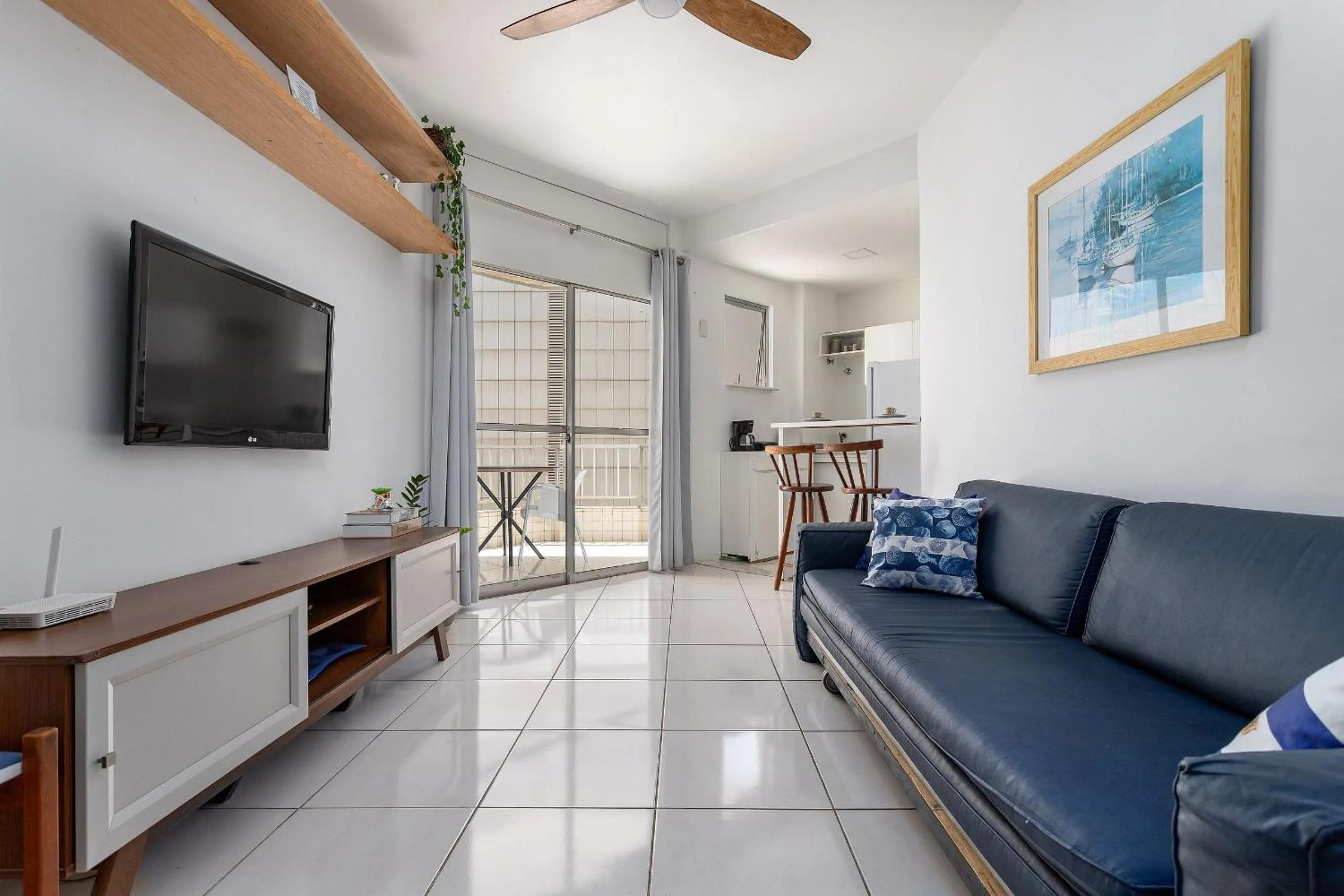 Communal lounge/ TV room in Rental Home Barra Palace Vista para o mar