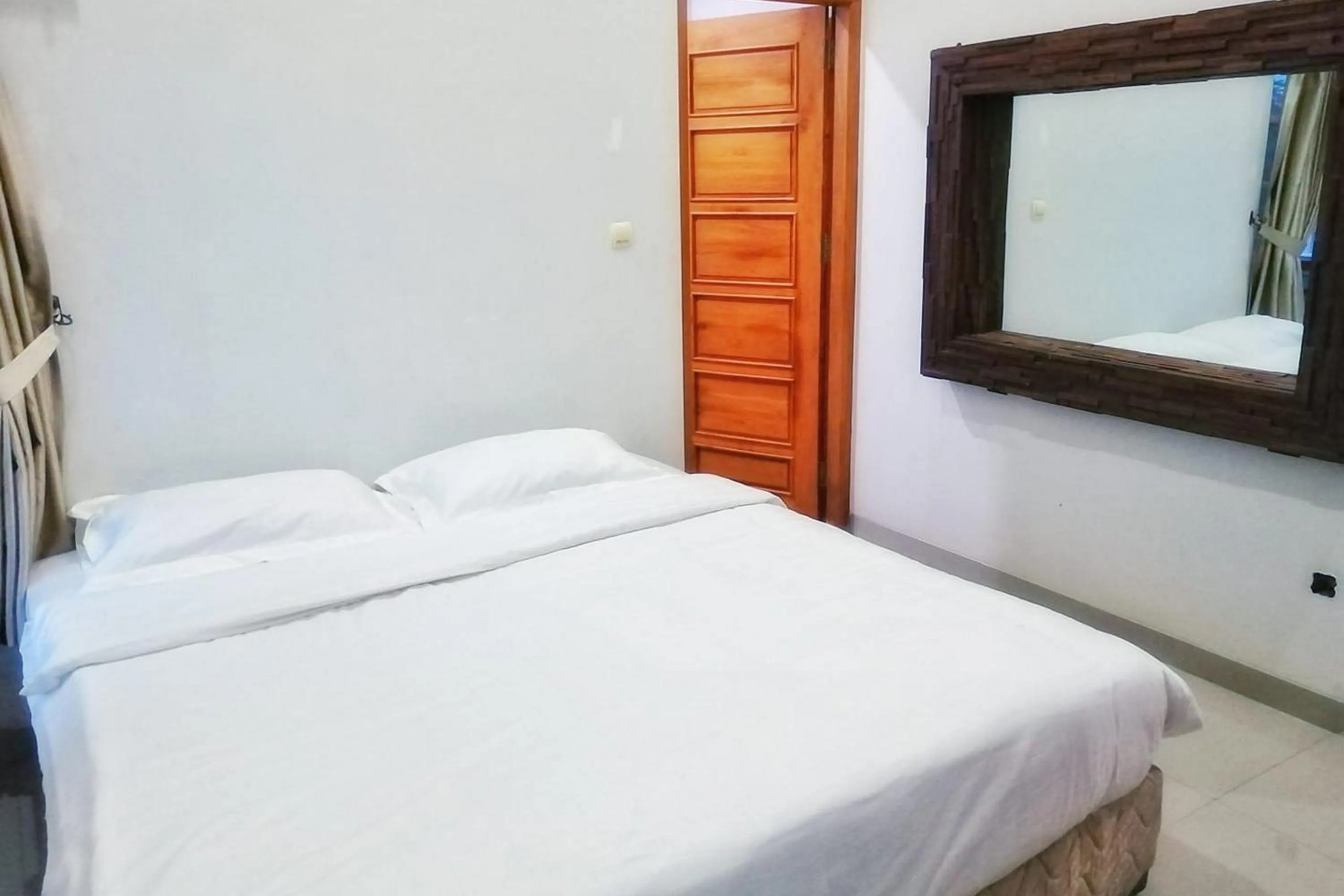 Bed in Tiray Homestay Syariah Yogyakarta Mitra RedDoorz