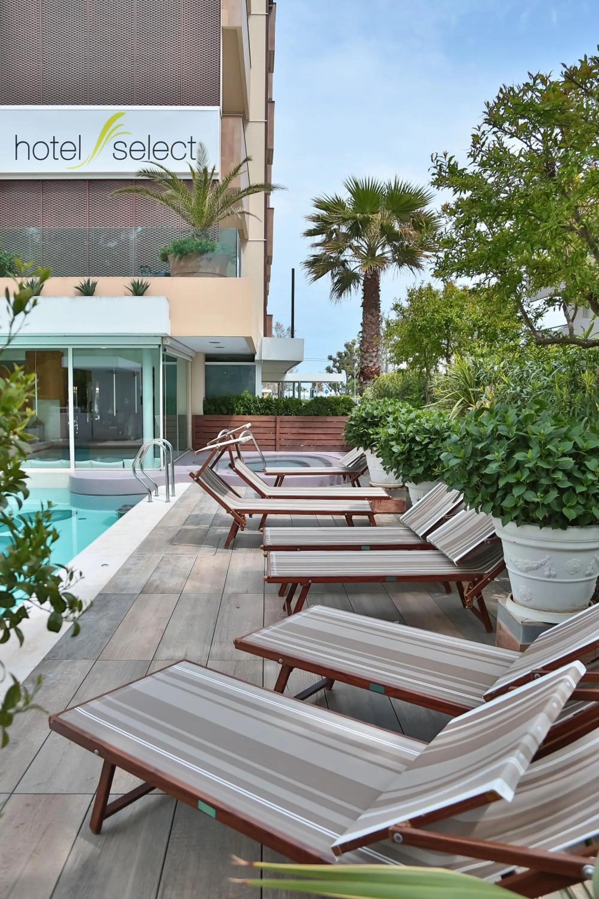 Property logo or sign in Hotel Select Suites & Spa - Apartments