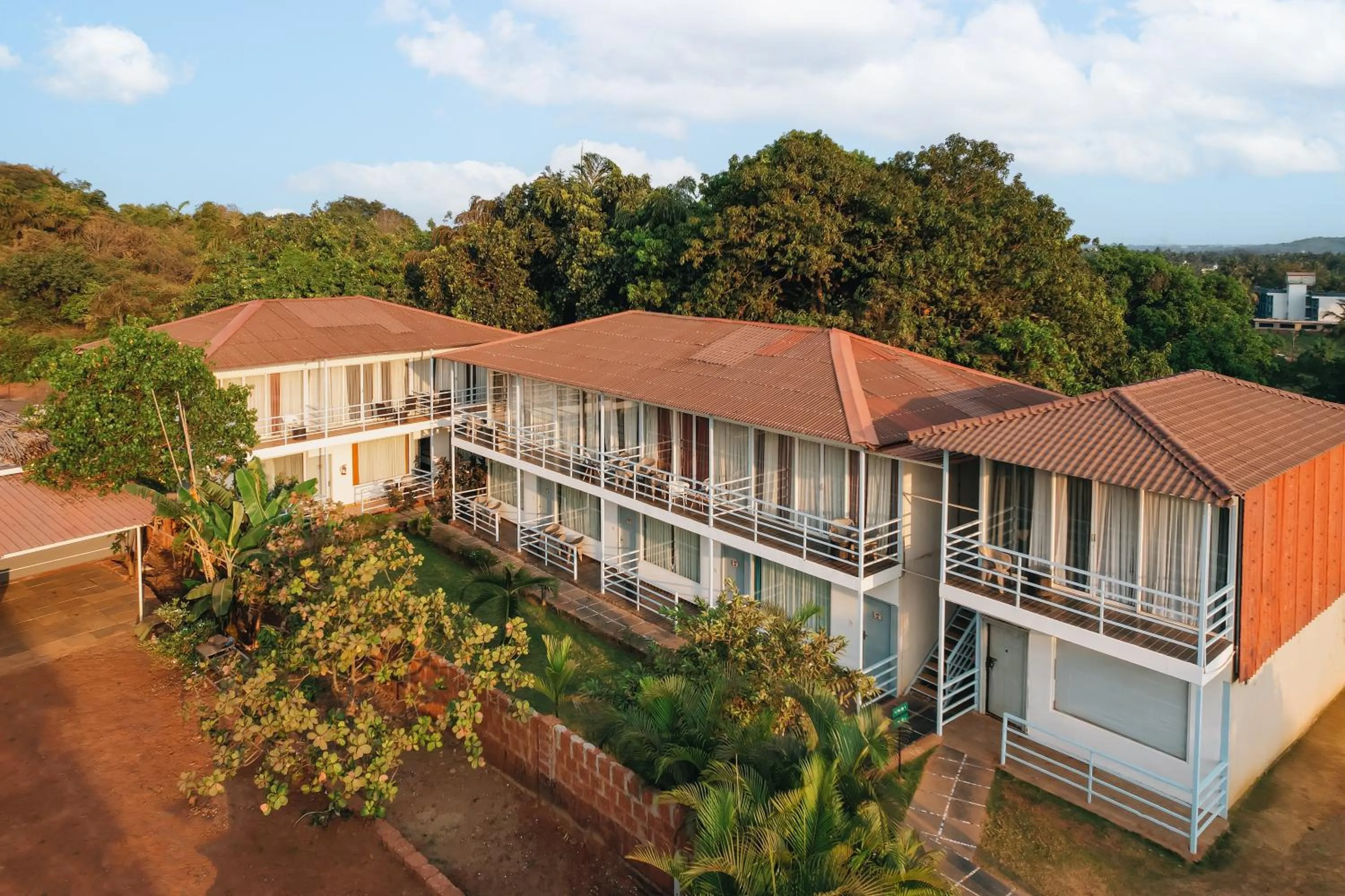 Property building in Koko Maya by Stone Wood Comfort