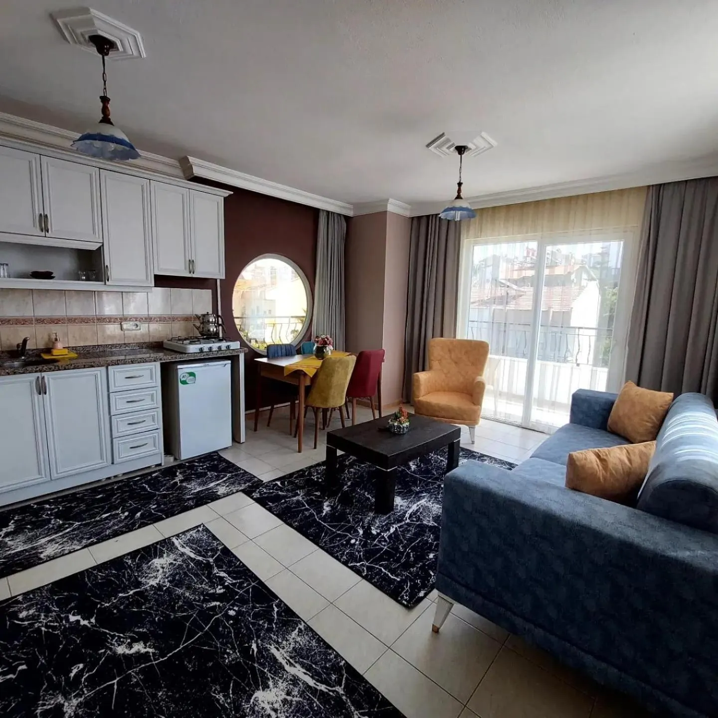 Kitchen or kitchenette in Summer rose hotel