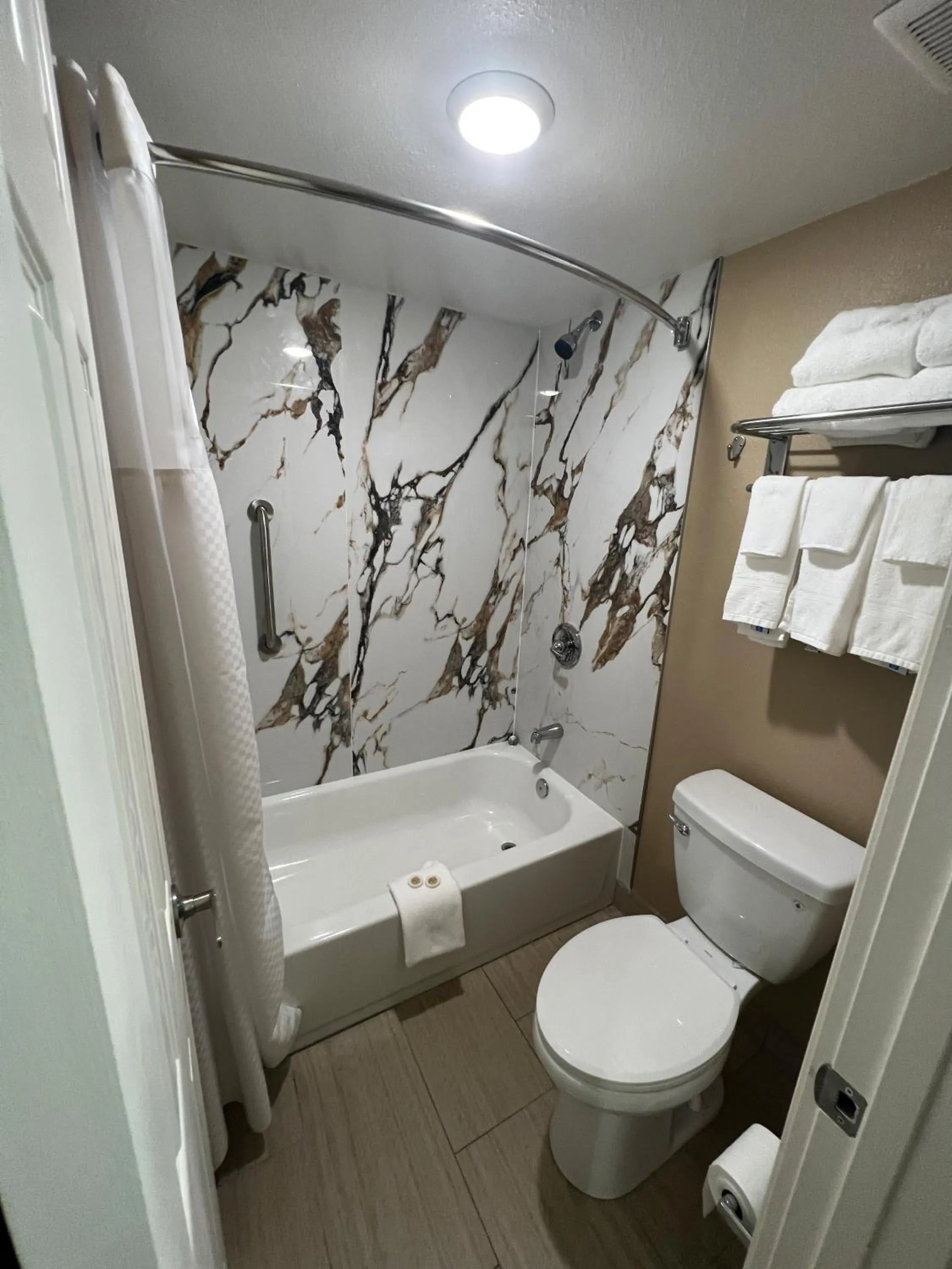 Bathroom in Super 8 by Wyndham Paducah I-24 Exit 4