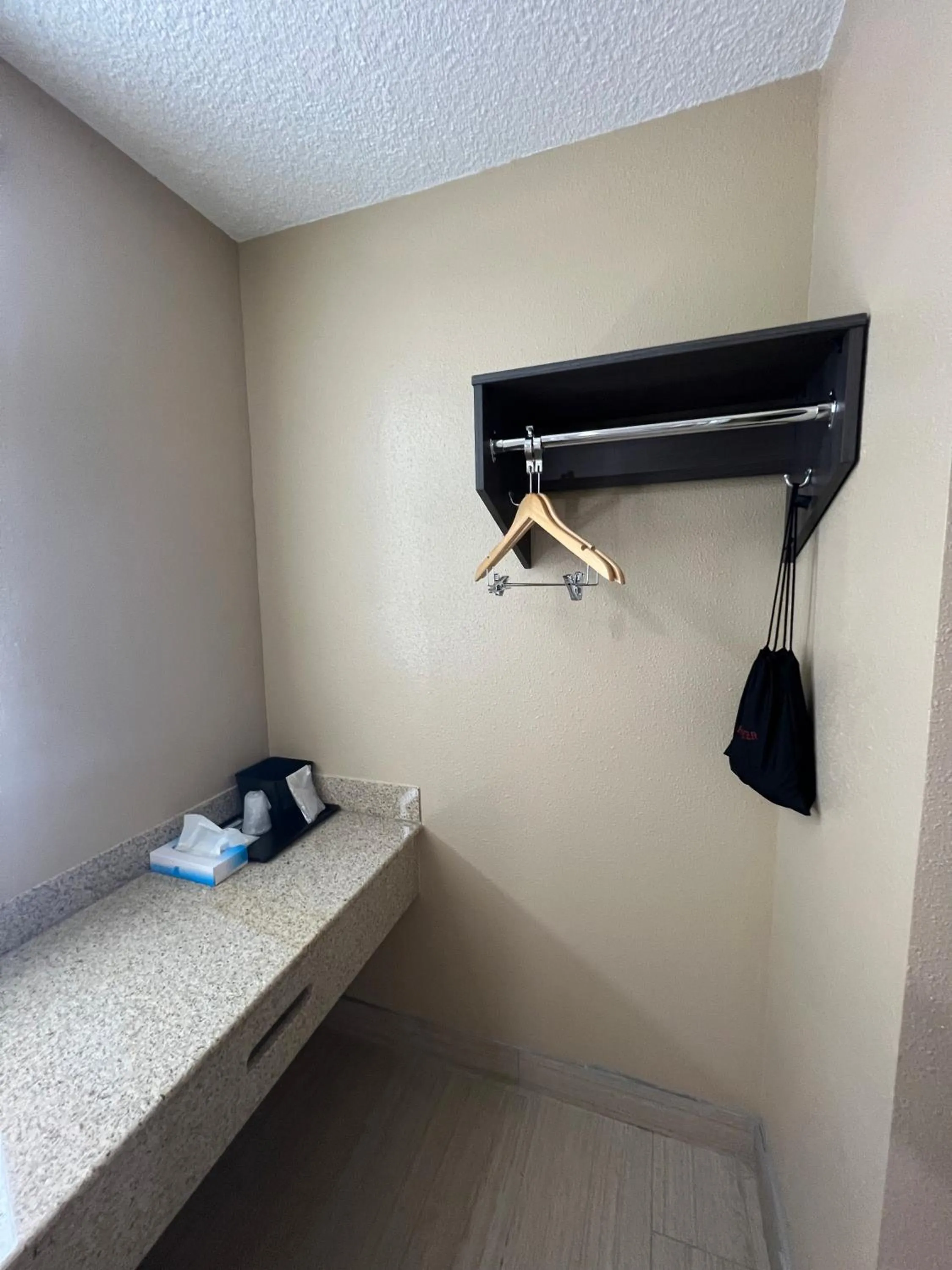 wardrobe in Super 8 by Wyndham Paducah I-24 Exit 4