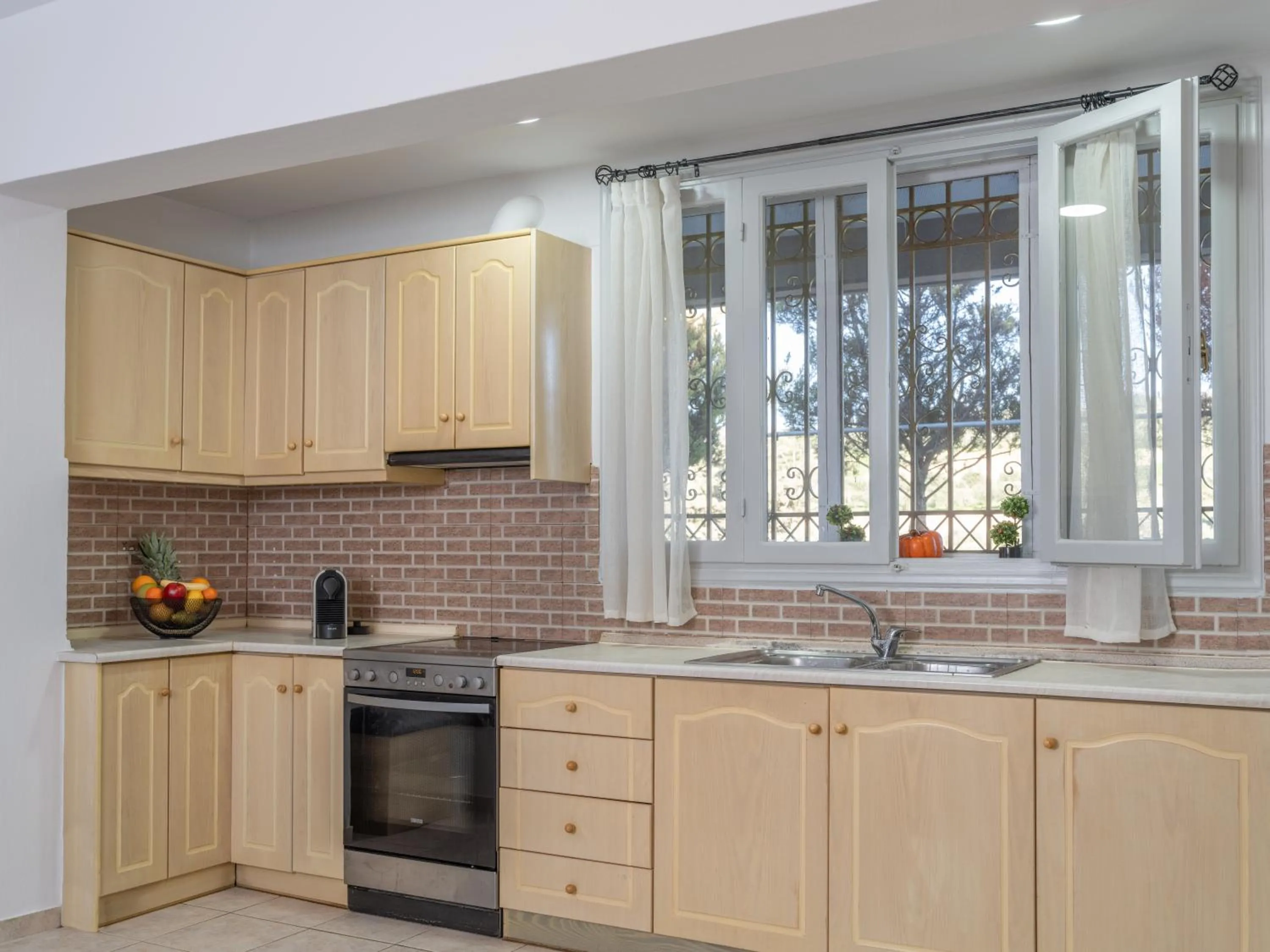 Kitchen or kitchenette in Aelia Home