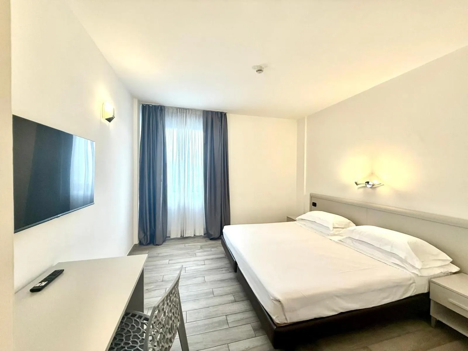 Bed in Toscana Ambassador