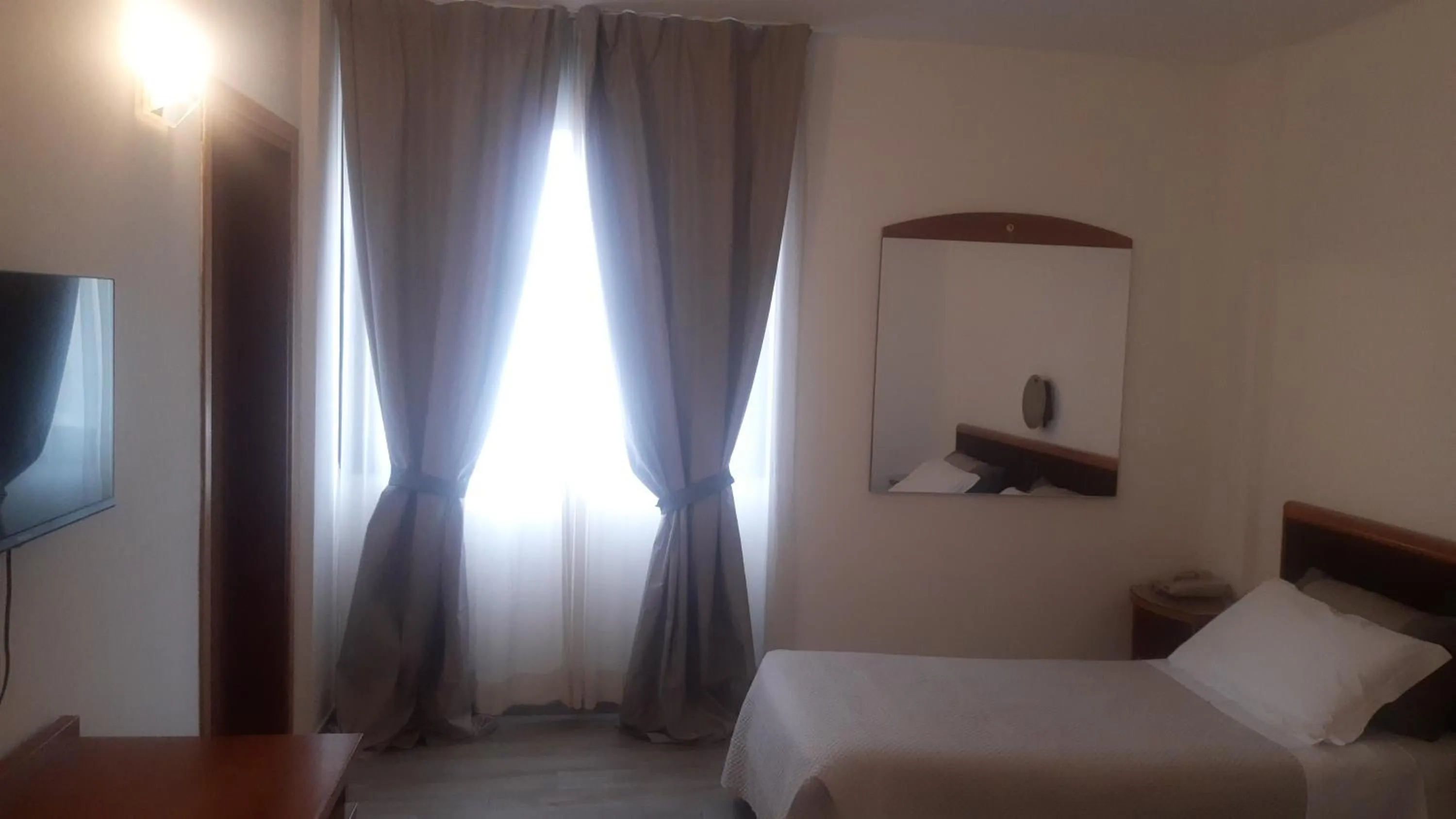 Bed in Toscana Ambassador