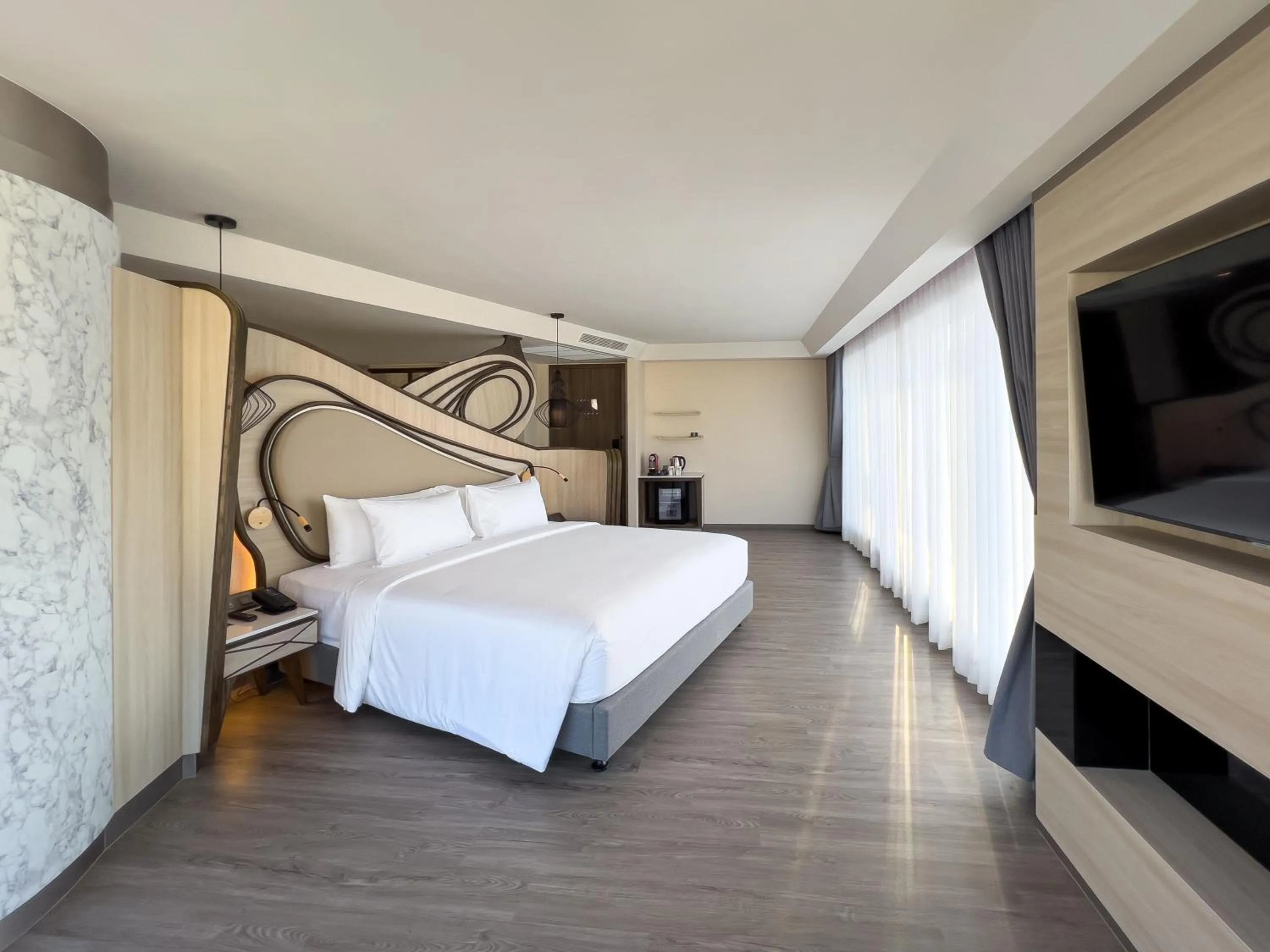 Bed in Amethyst Hotel Pattaya