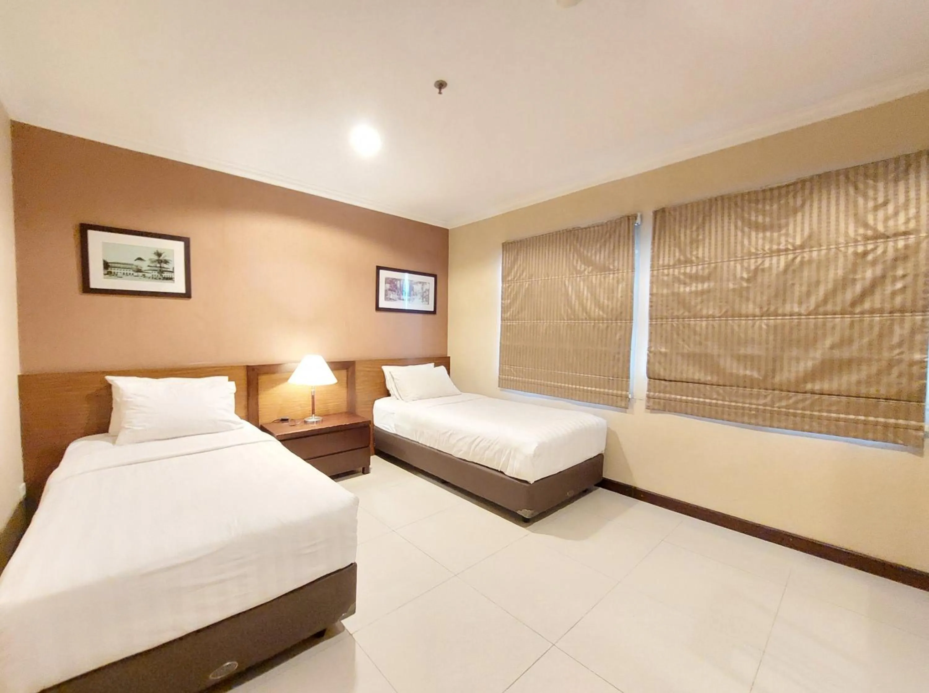 Bedroom, Bed in High Livin Apartment Ciumbuleuit