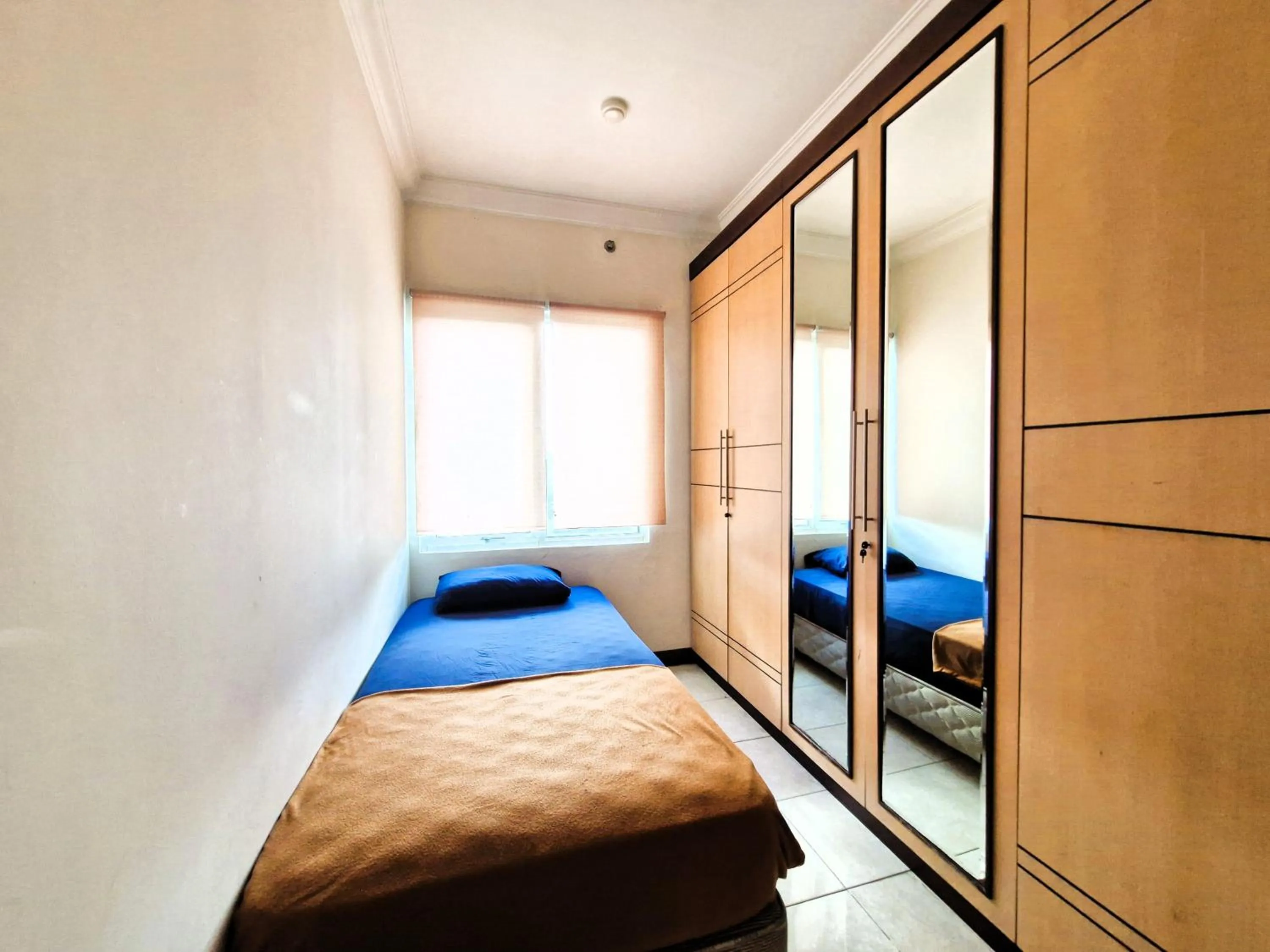 Bedroom, Bed in High Livin Apartment Ciumbuleuit