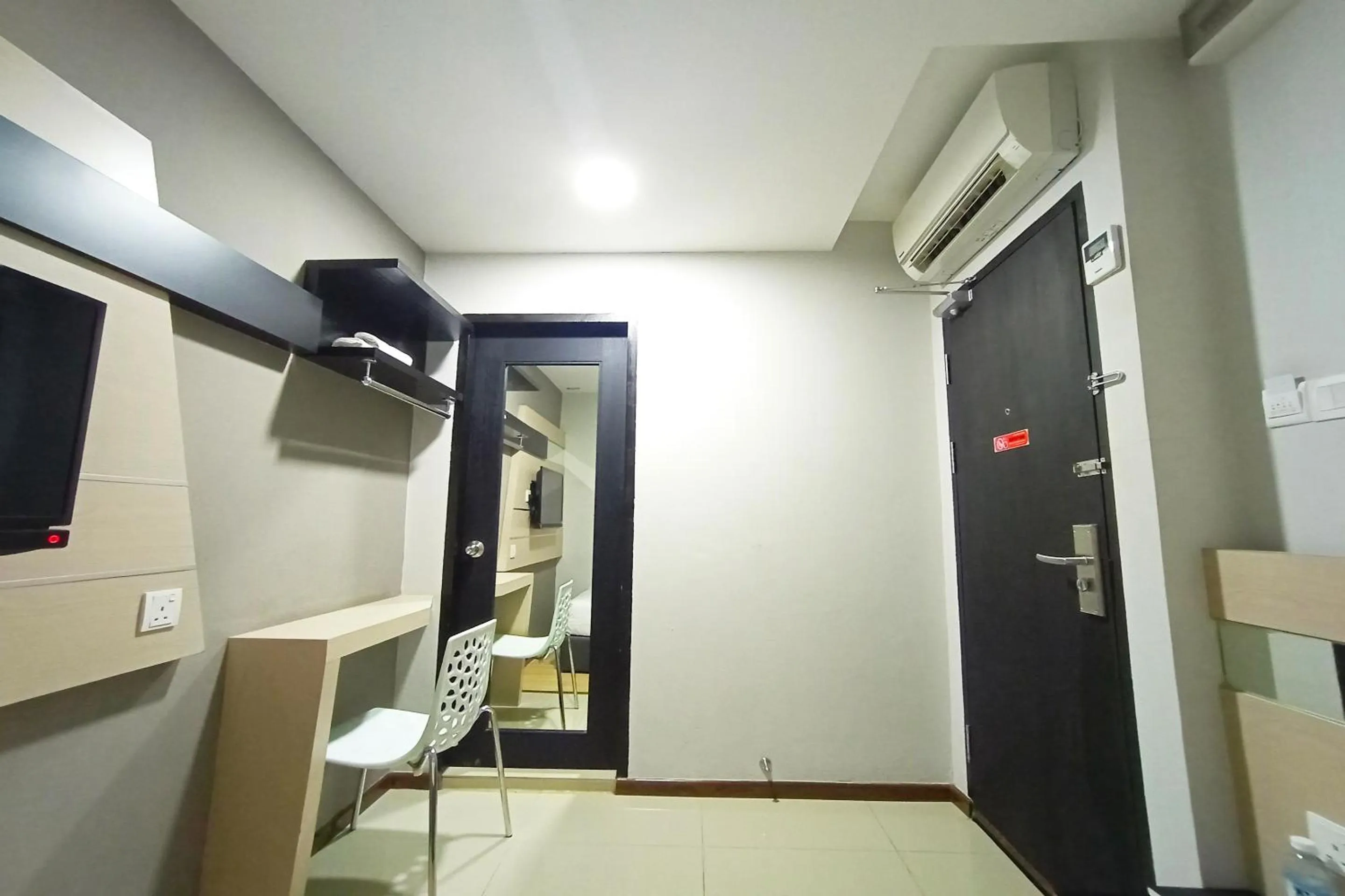 Bedroom in Hotel O Hi Inn