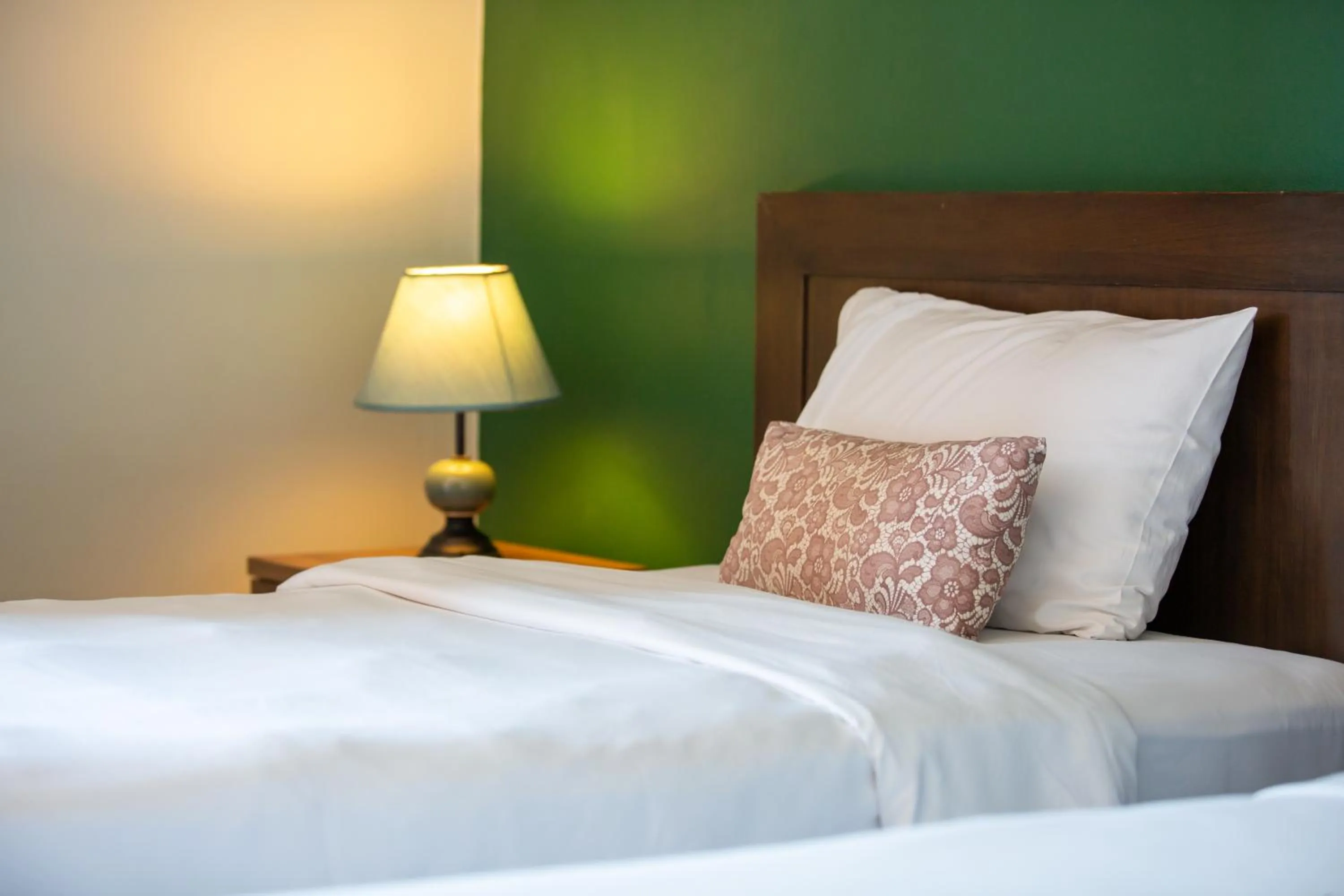 Bed in WE Valley Hotel