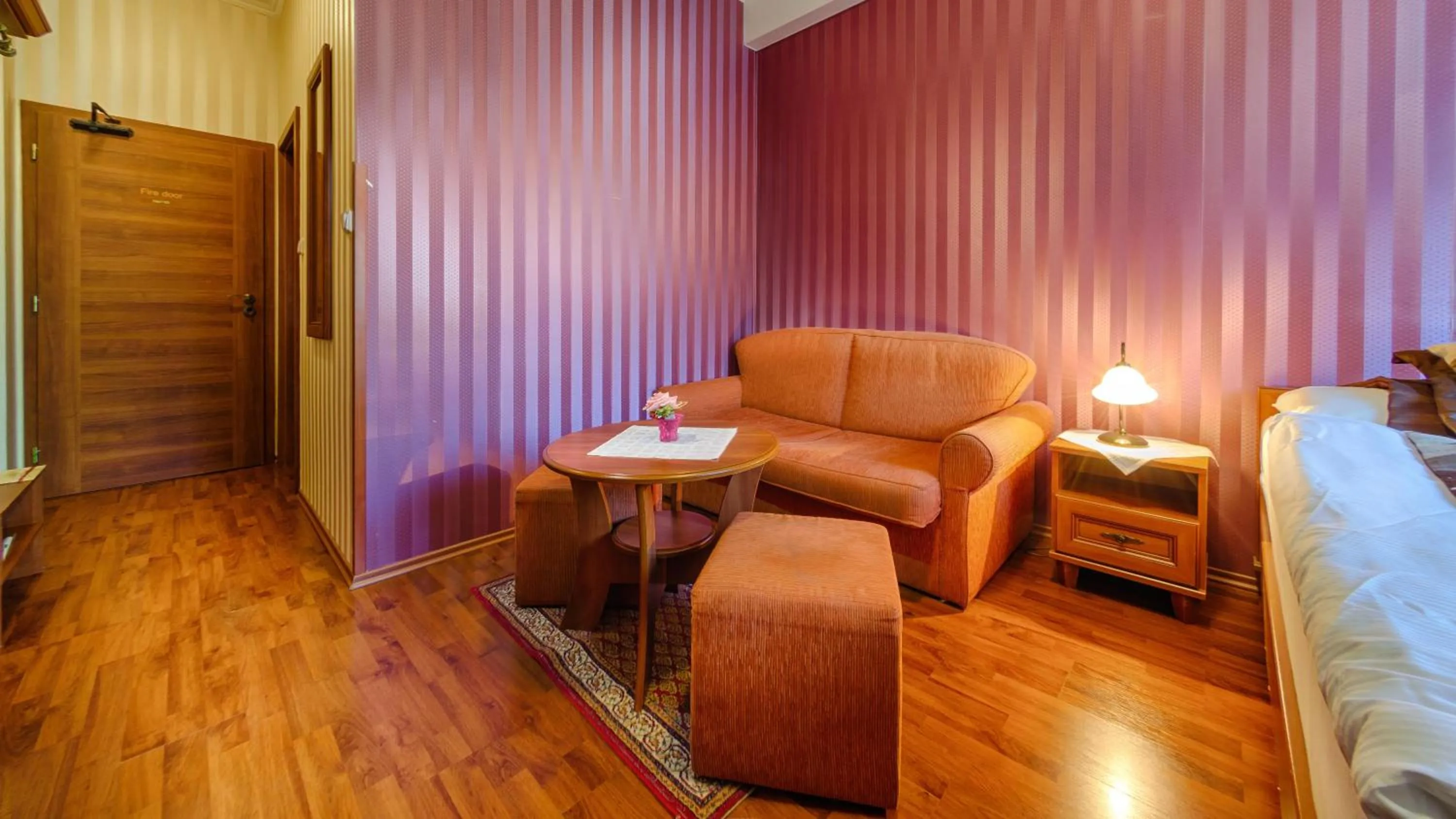 Seating area, Bed in Hotel Tevel