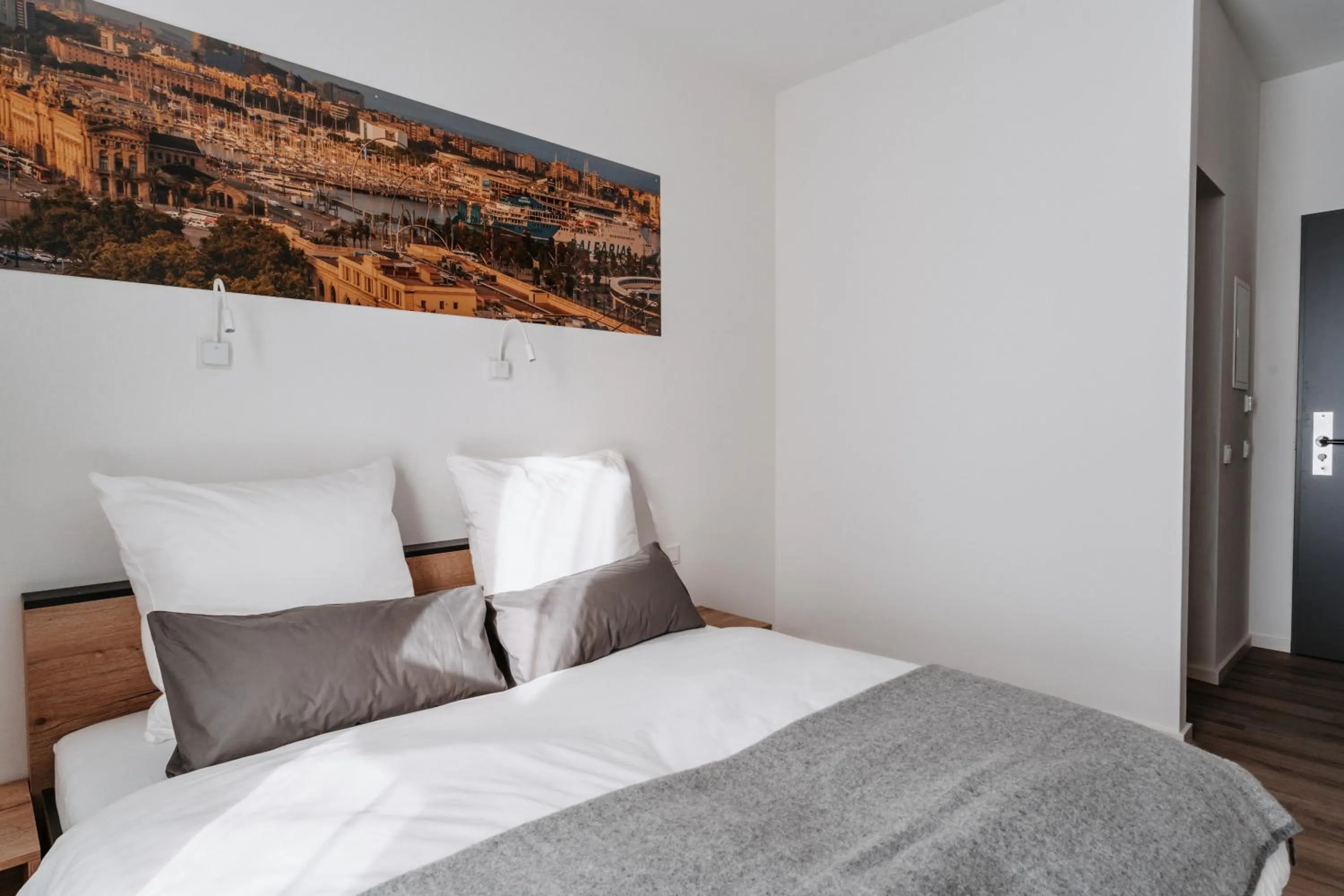 Bed in STEP INN The Fair Hotel