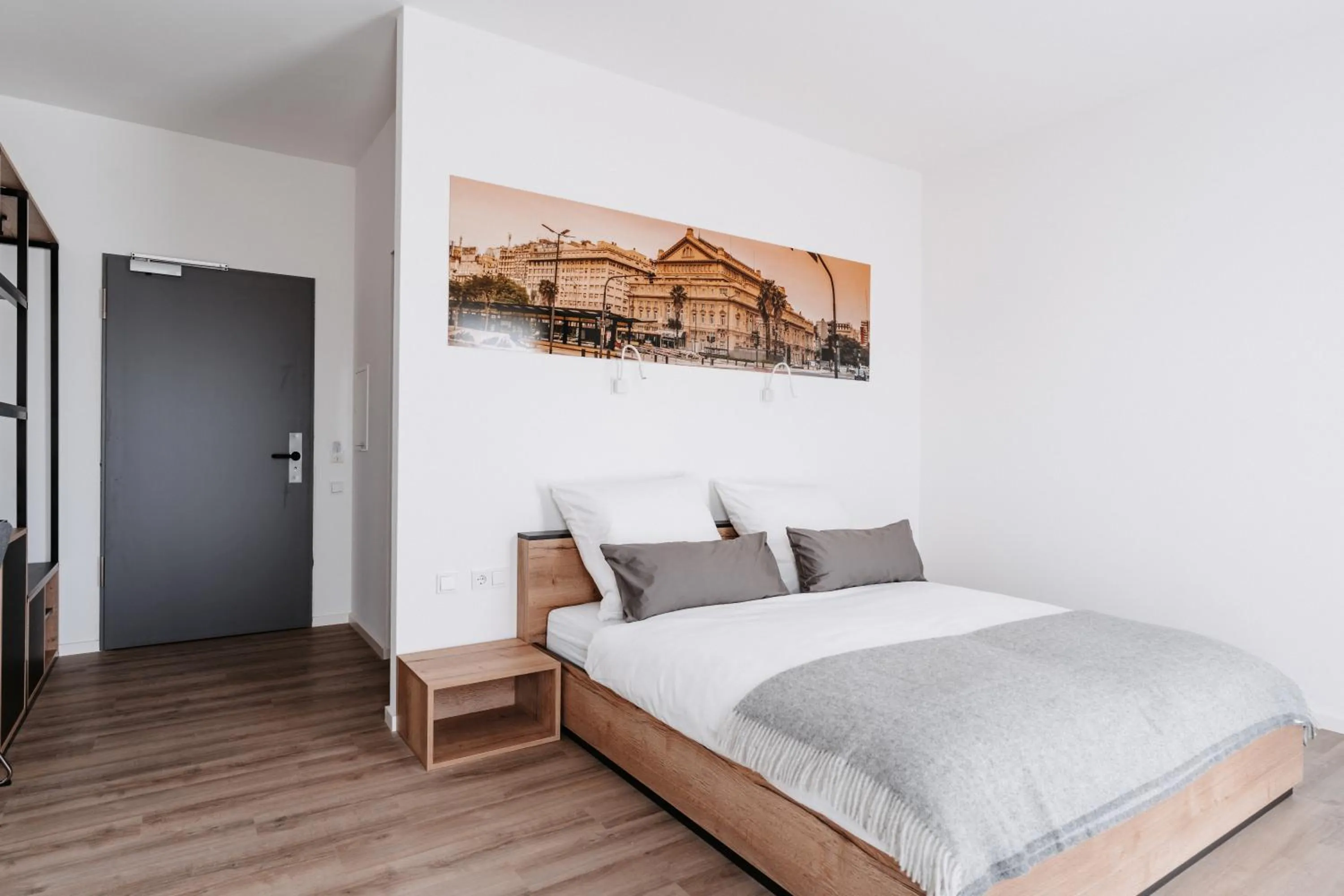 Bed in STEP INN The Fair Hotel