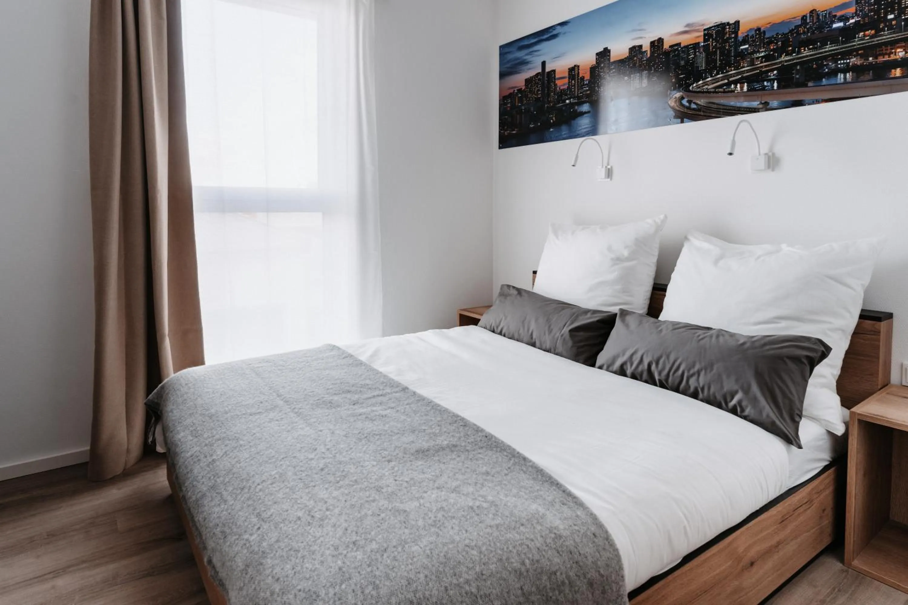 Bed in STEP INN The Fair Hotel