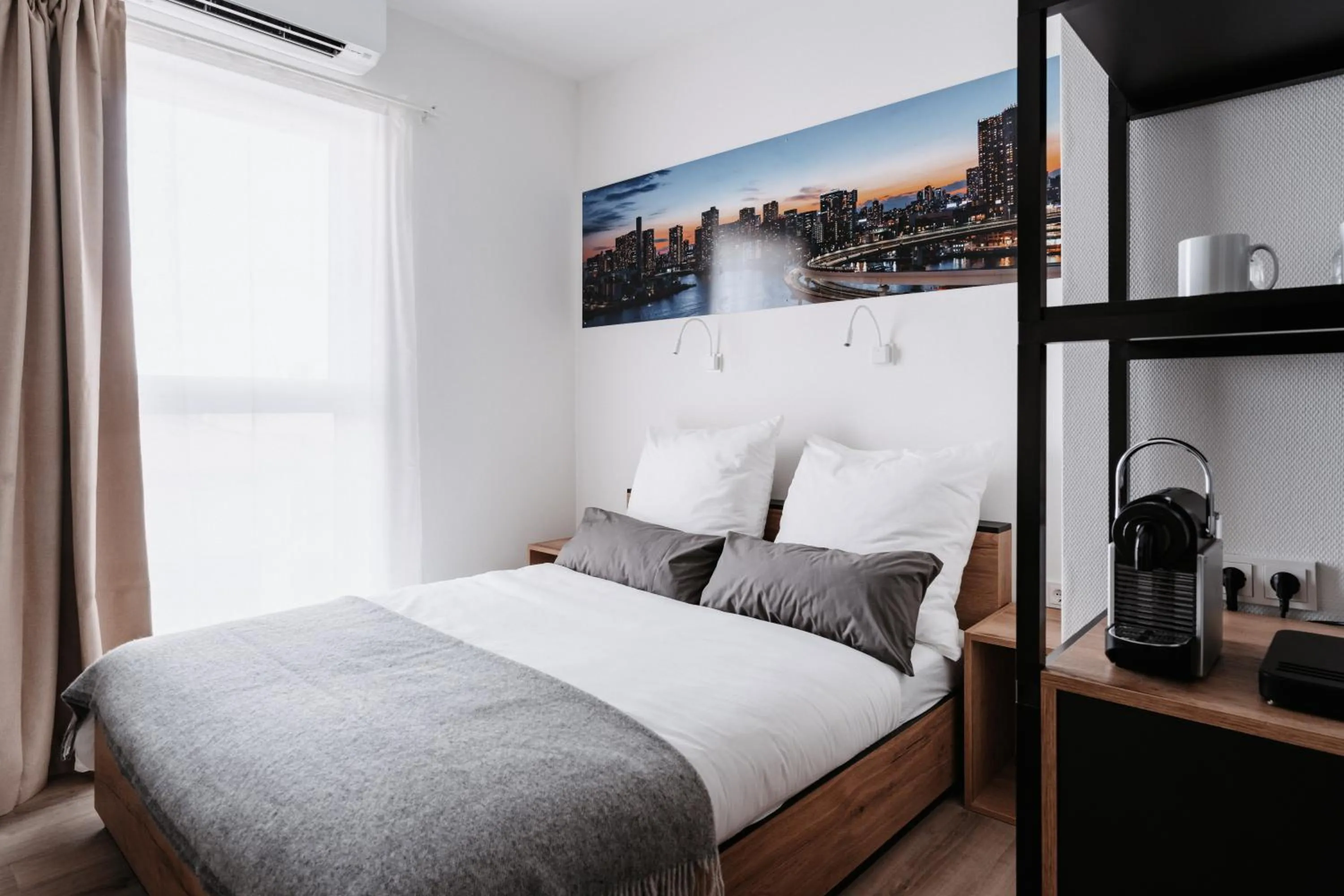 Bed in STEP INN The Fair Hotel