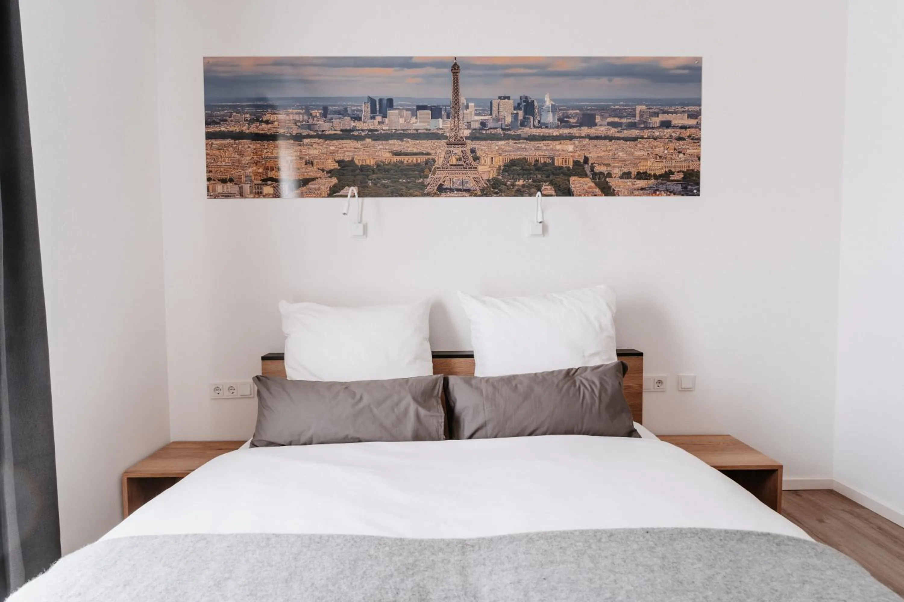 Bed in STEP INN The Fair Hotel