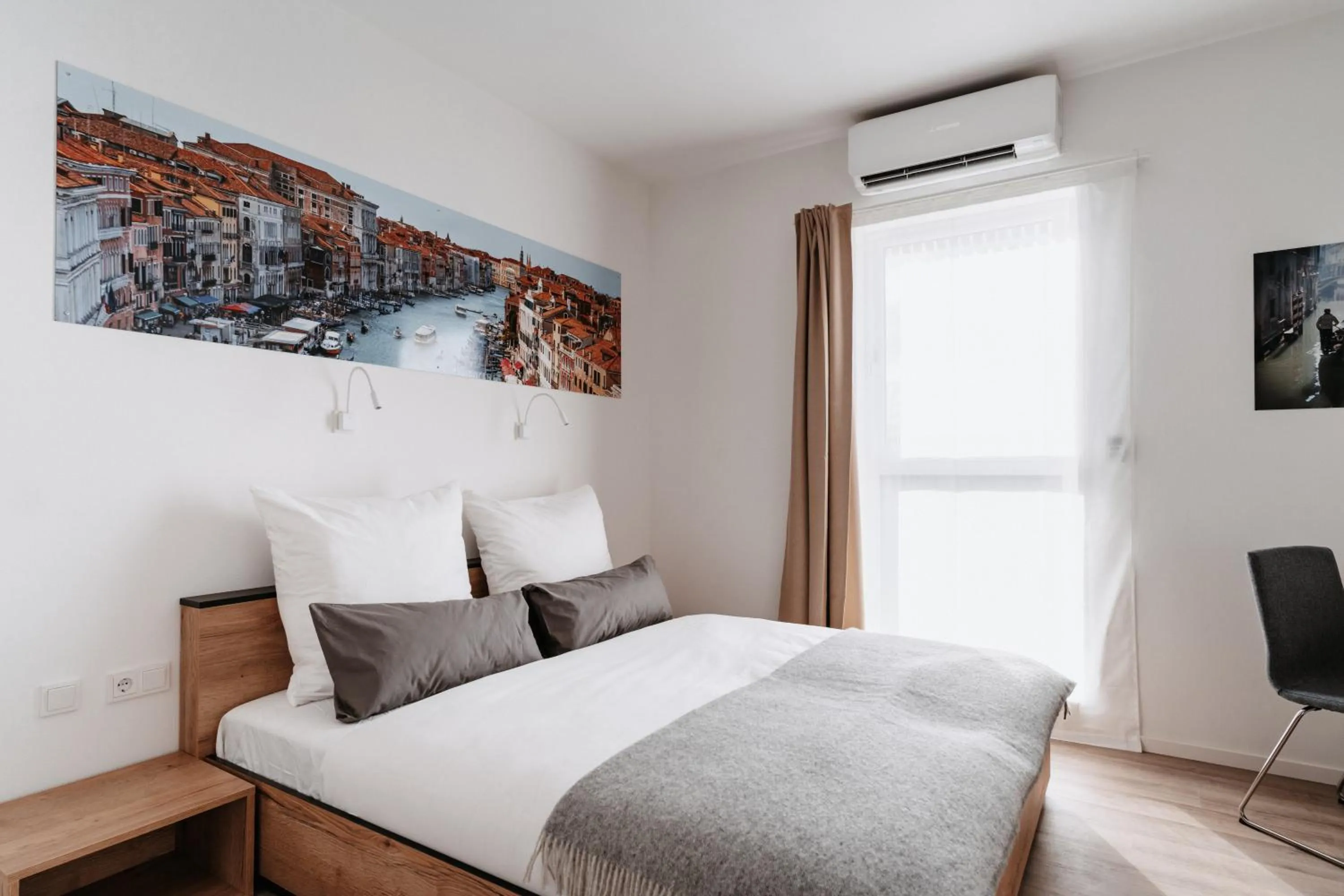 Bed in STEP INN The Fair Hotel