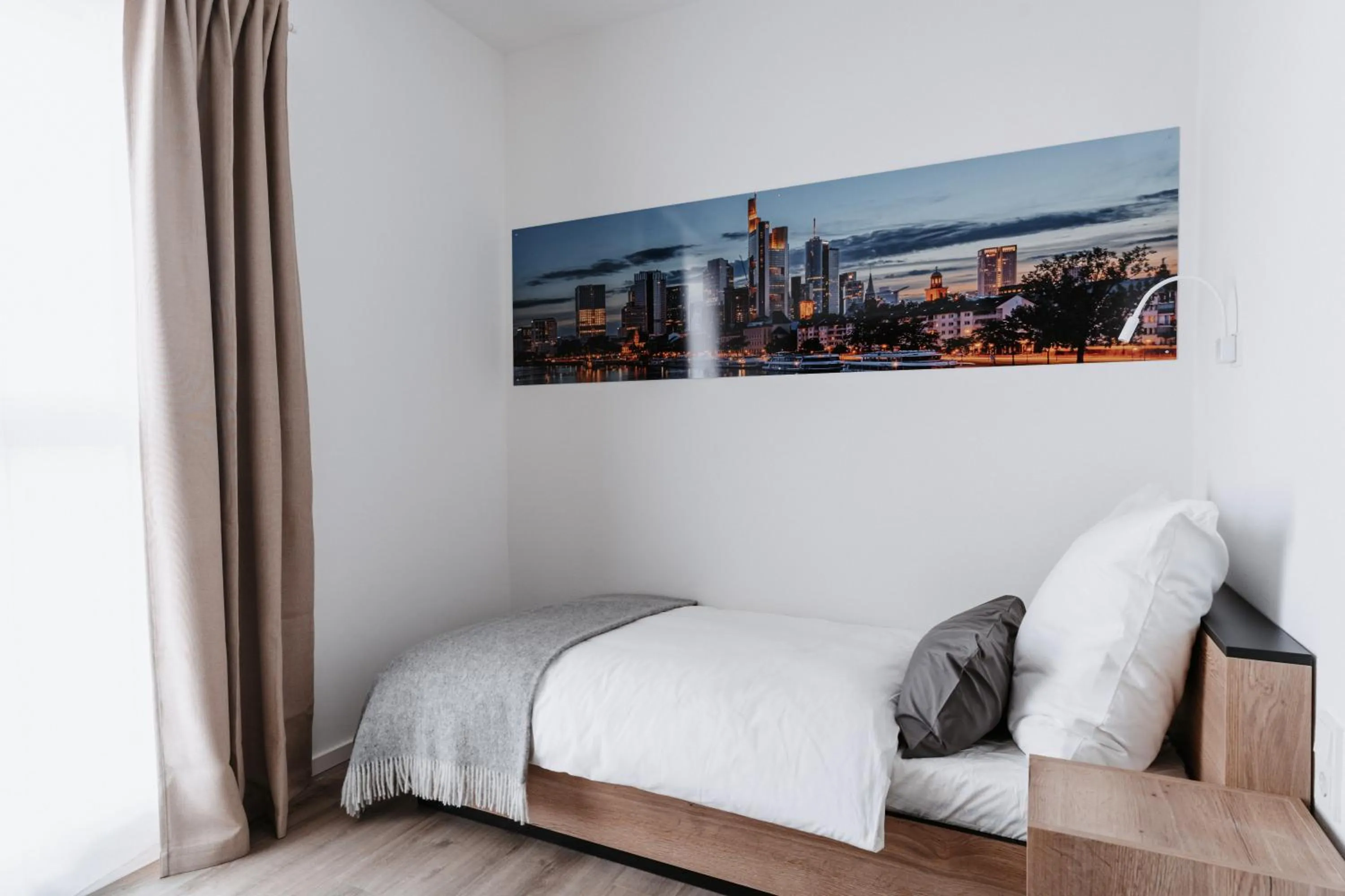 Bed in STEP INN The Fair Hotel