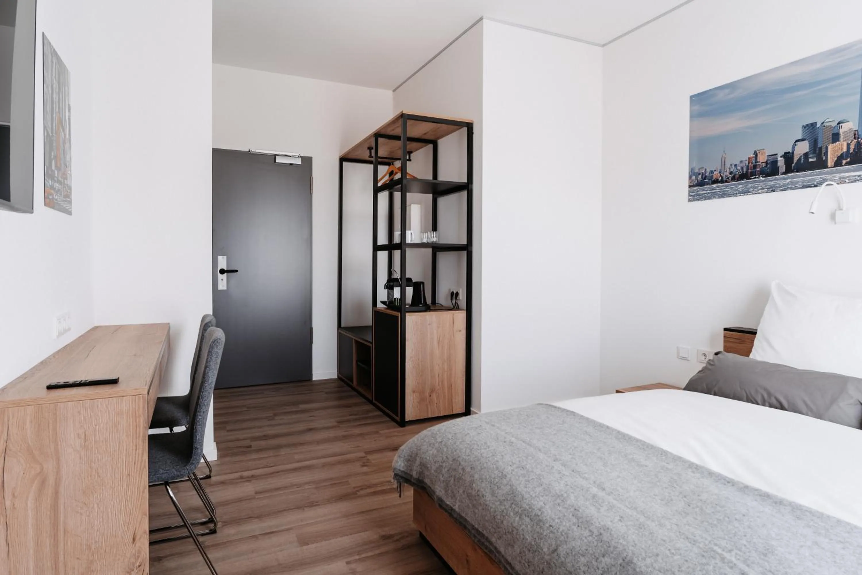 Bed in STEP INN The Fair Hotel