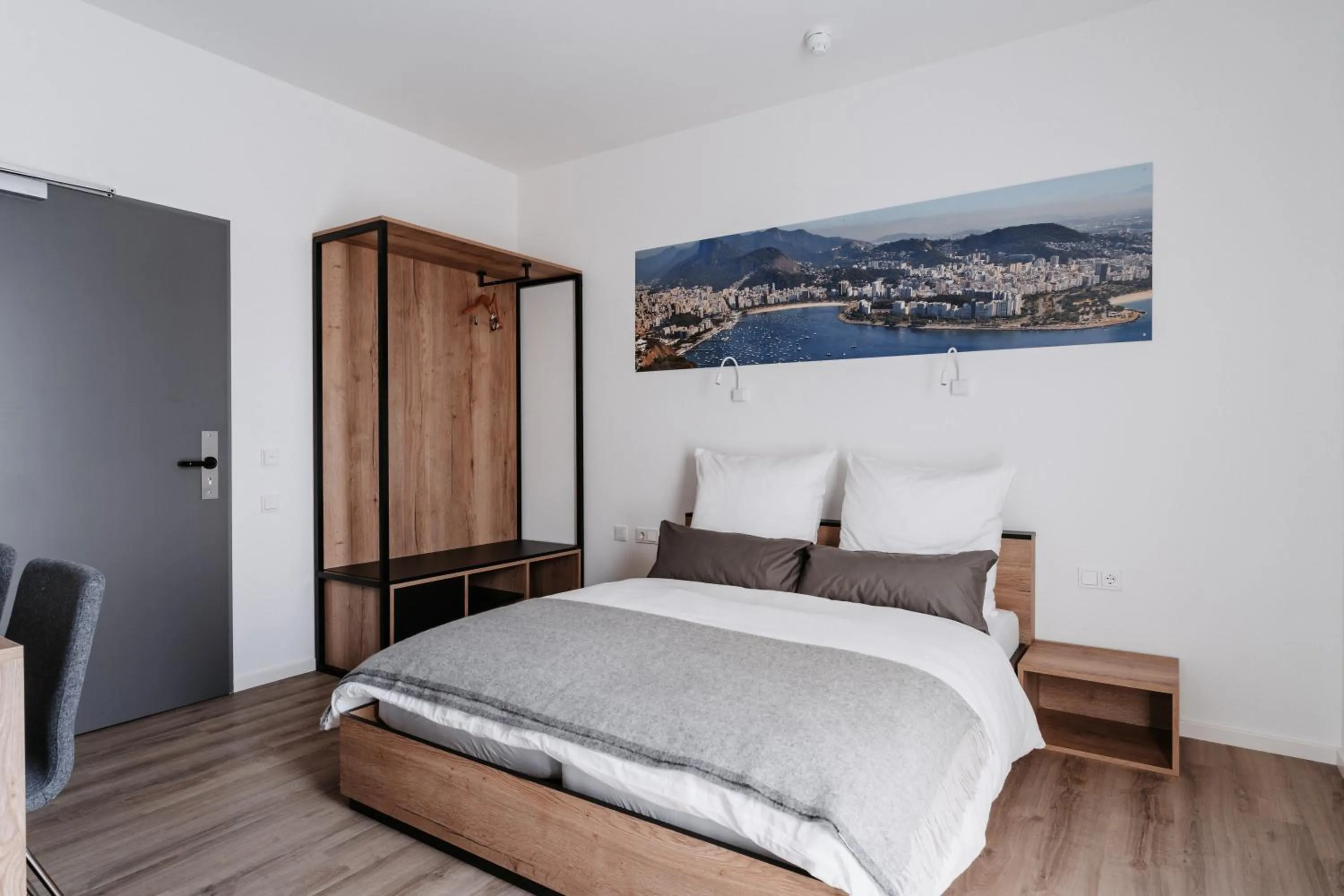 Bed in STEP INN The Fair Hotel