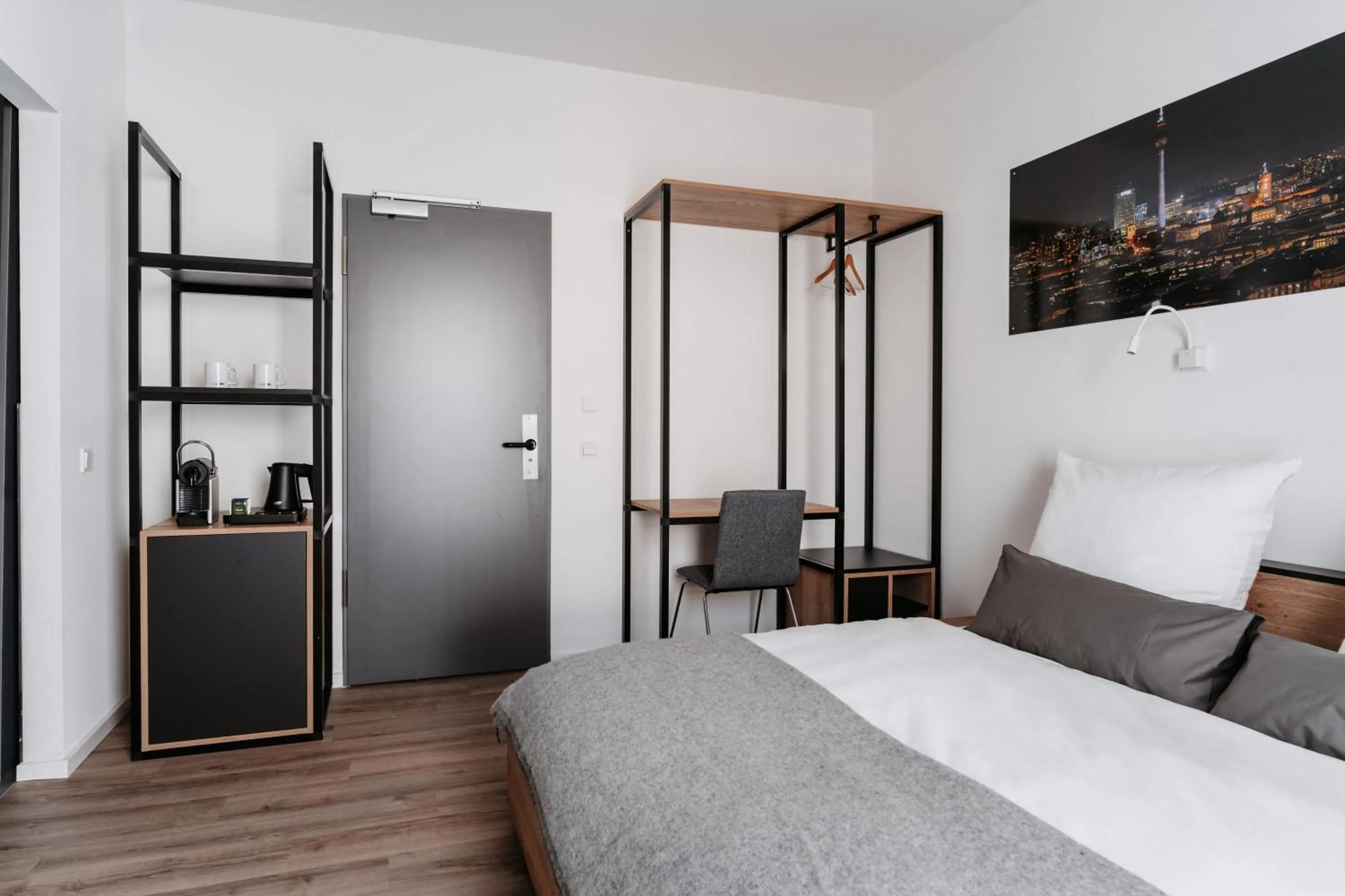 Bed in STEP INN The Fair Hotel