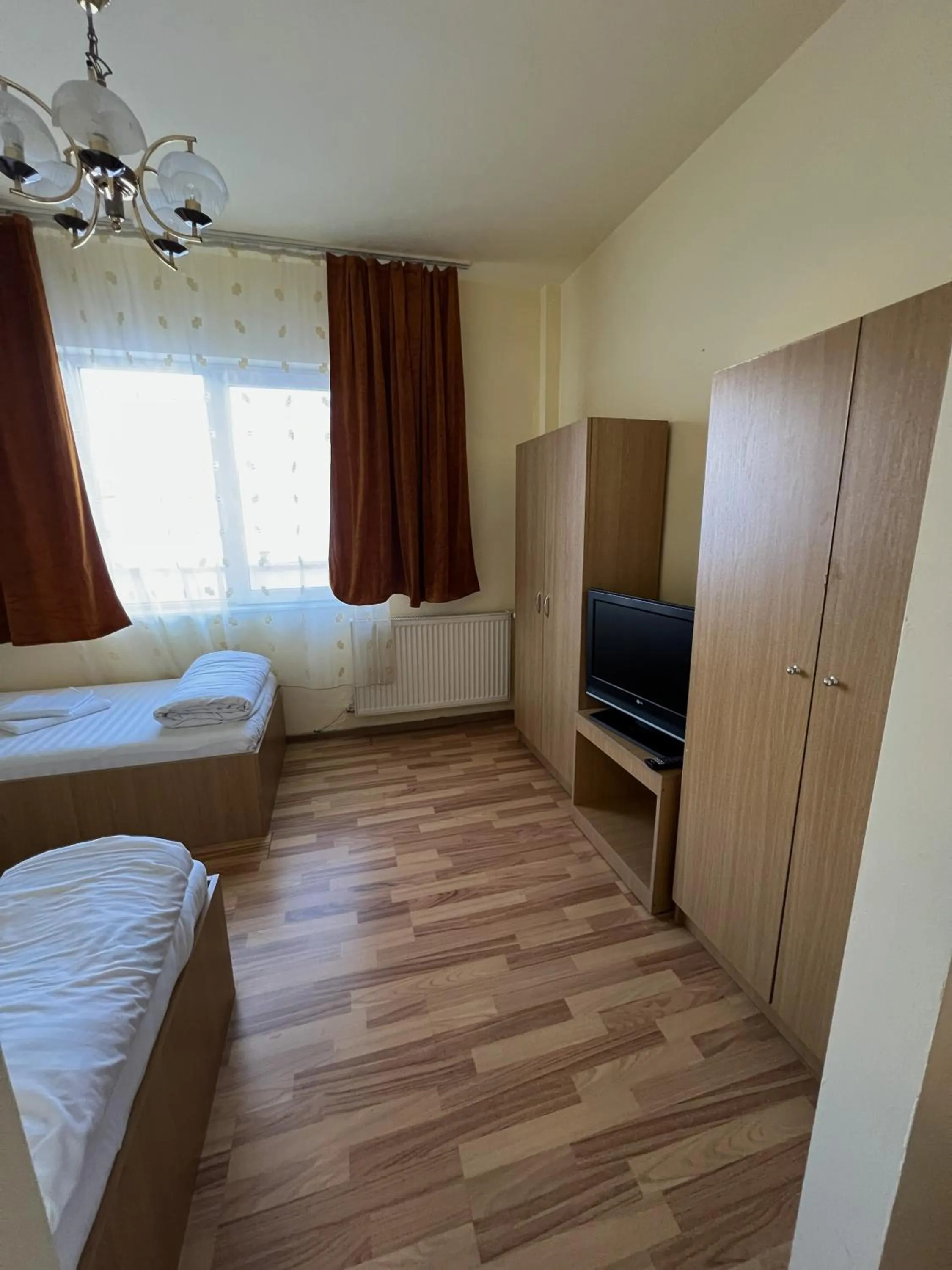 Bed in Hotel Decebal Bistrita