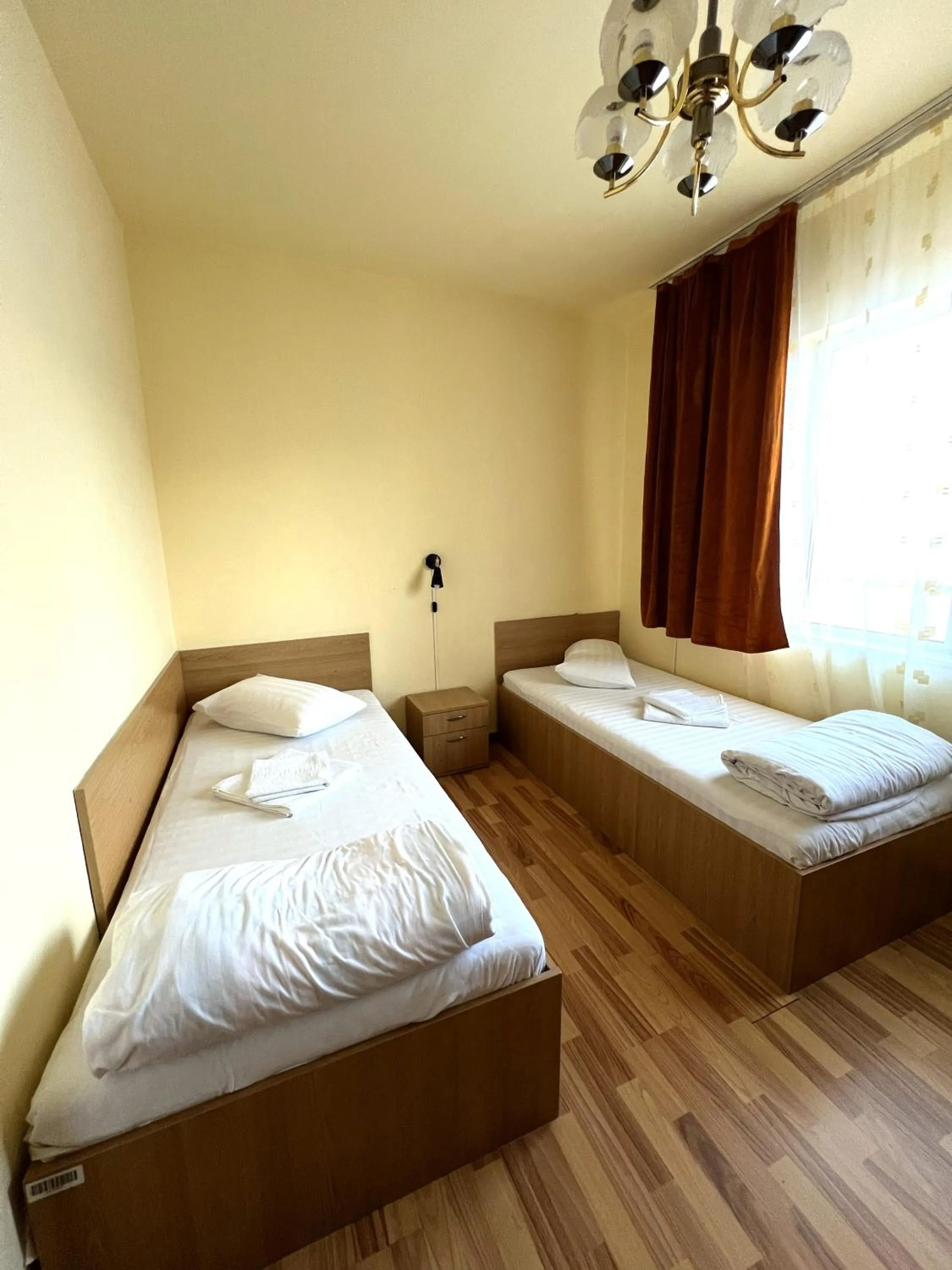 Bed in Hotel Decebal Bistrita