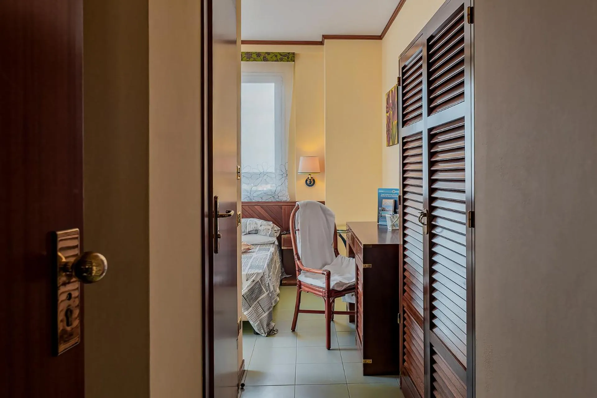 Decorative detail, Bed in Hotel Tornese - Rooftop Sea View